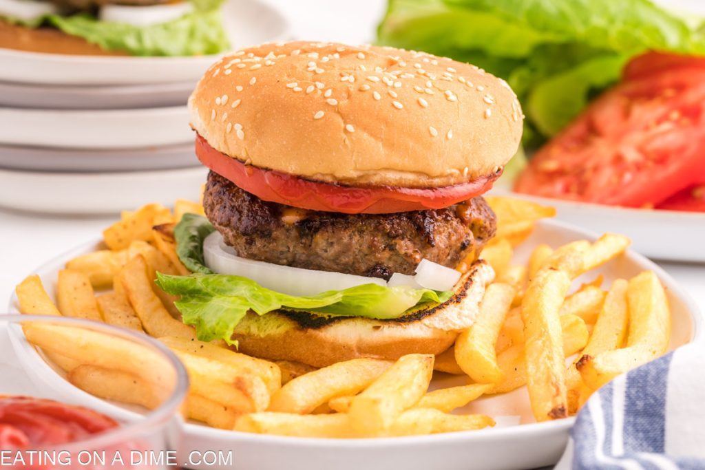 Cheese Stuffed Burger on a plate with french fries