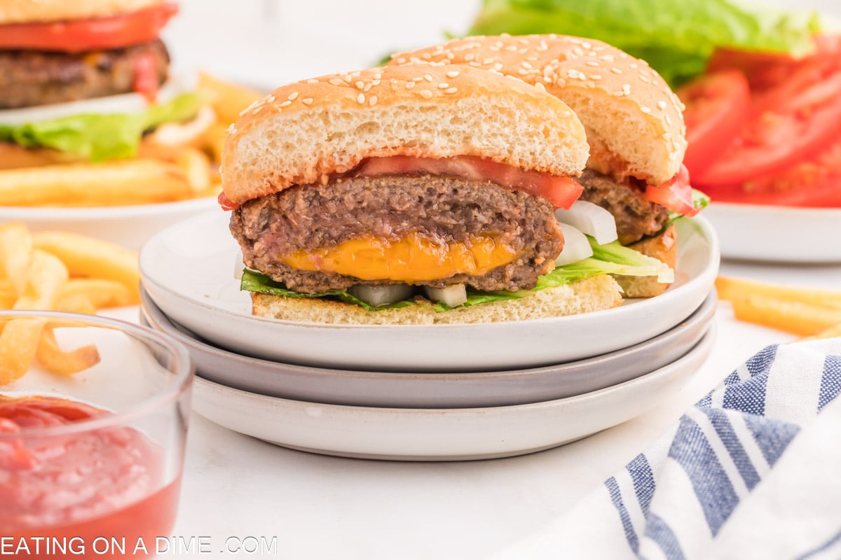 Cheese Stuffed Burger on a plate cut in half