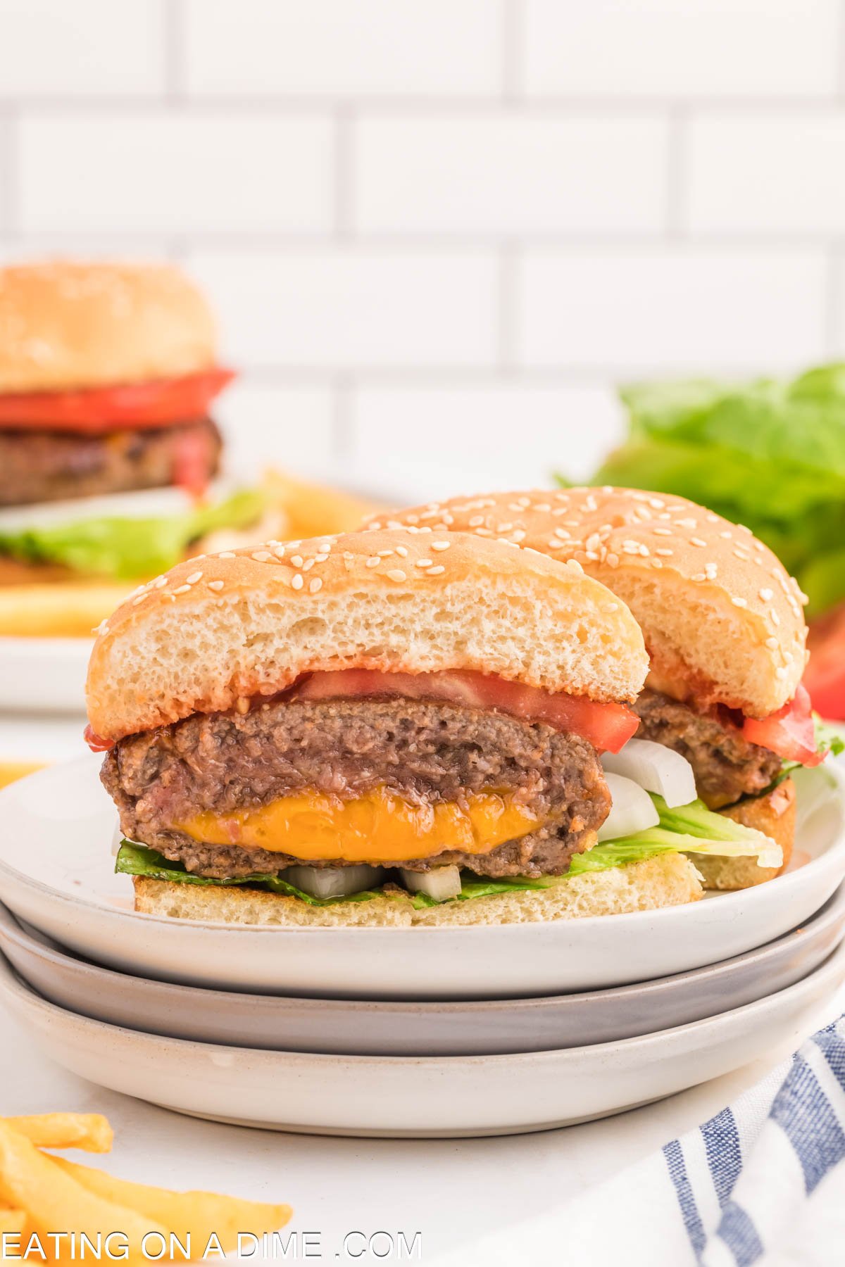 Cheese Stuffed Burger on a plate cut in half