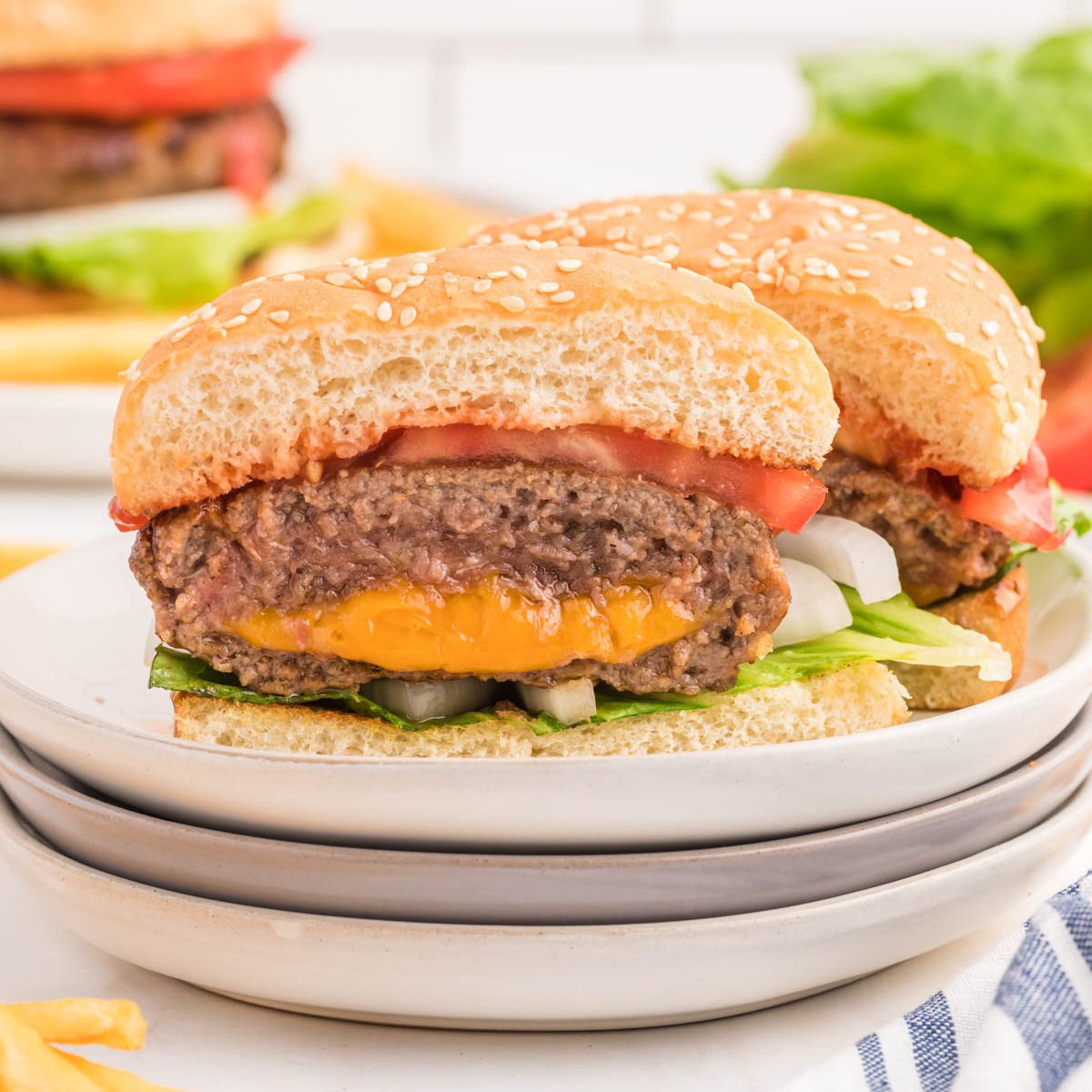 Cheese Stuffed Burger on a plate cut in half