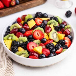Fruit Salad in a white bowl.