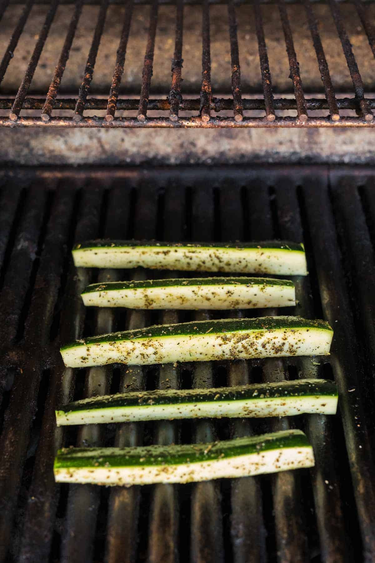 Seasoned Zucchini spears on the grill