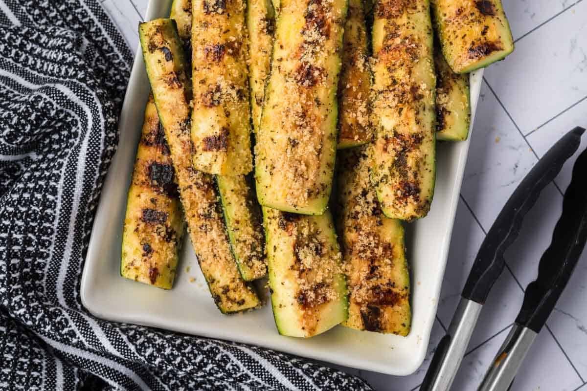 Parmesan Zucchini Spears stacked on a platter