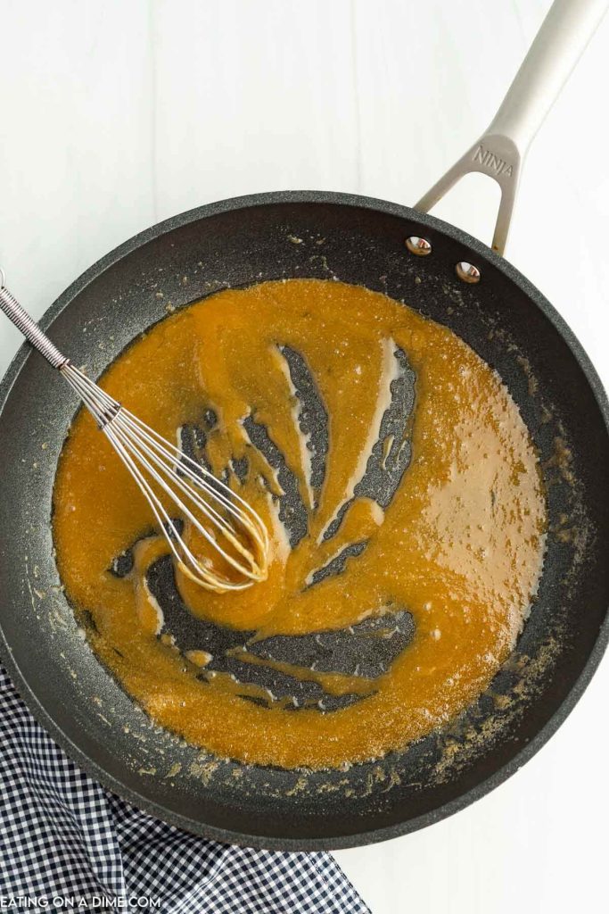 Melting butter and brown sugar in skillet