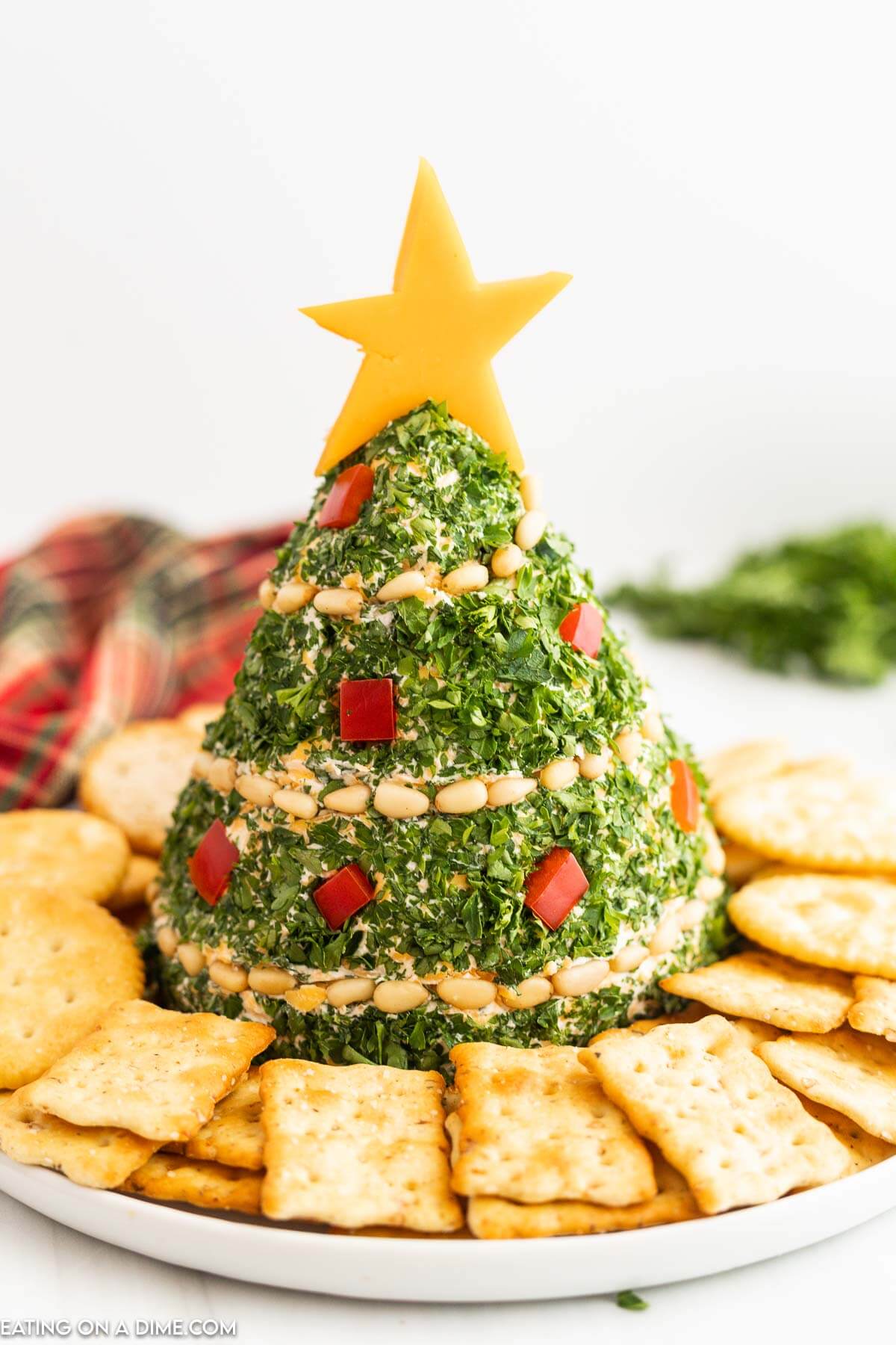 Christmas tree cheese ball on a platter. 