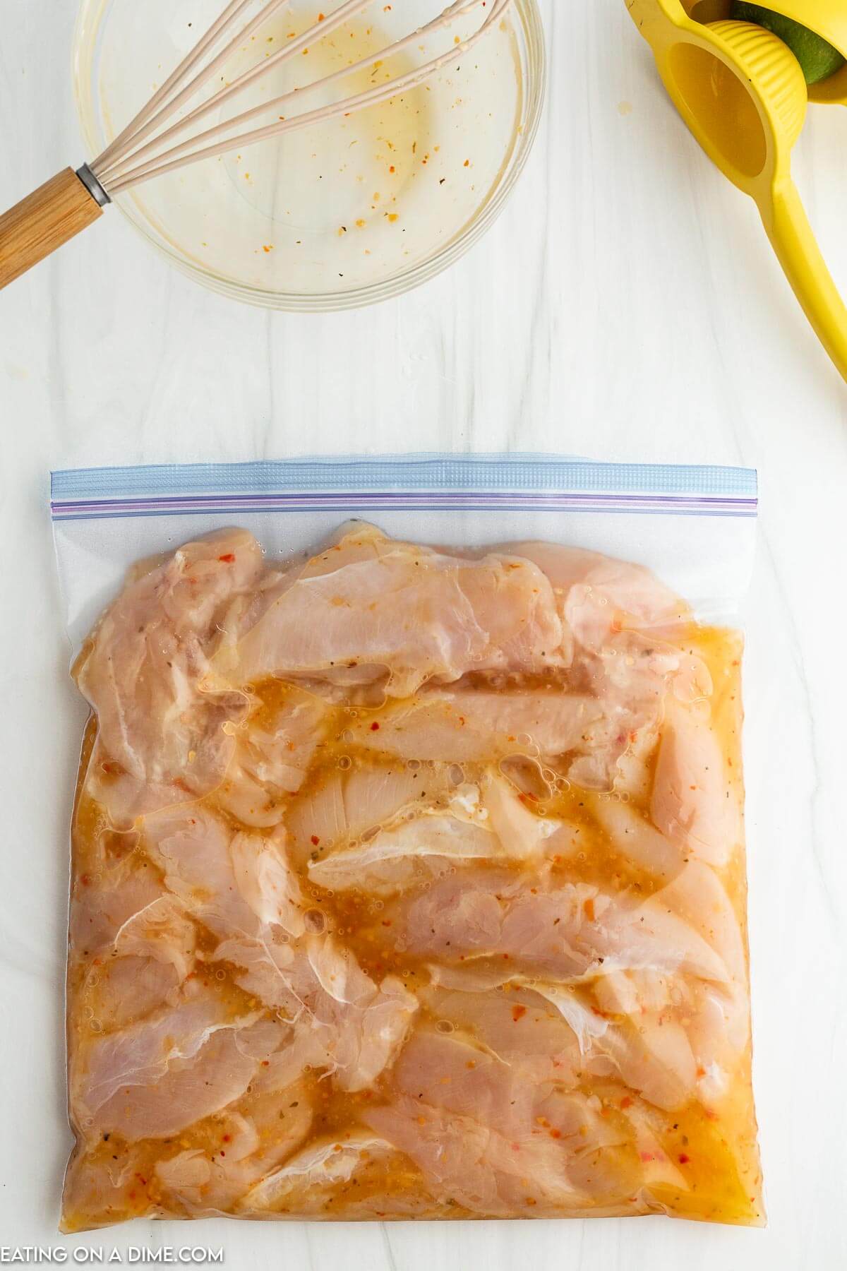 Chicken in a gallon bag with marinade. 