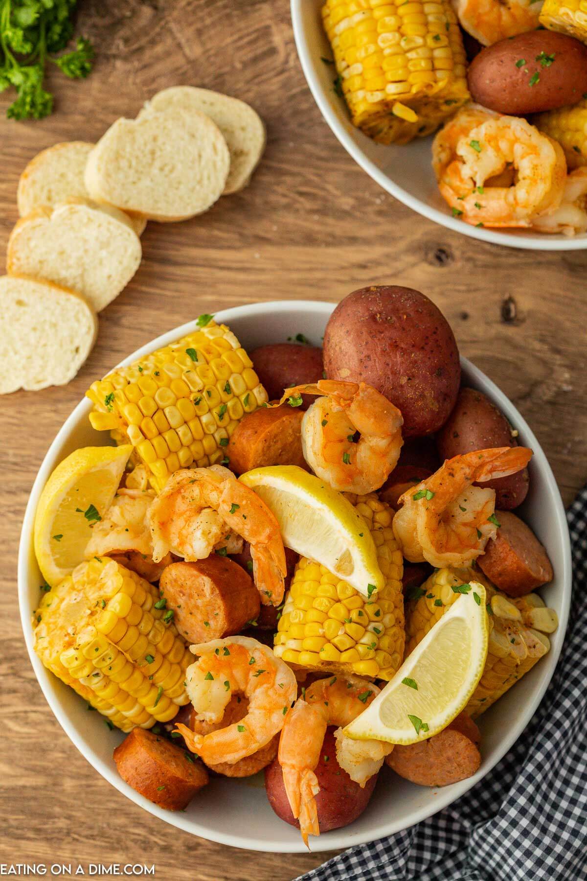 Shrimp boil in a white bowl