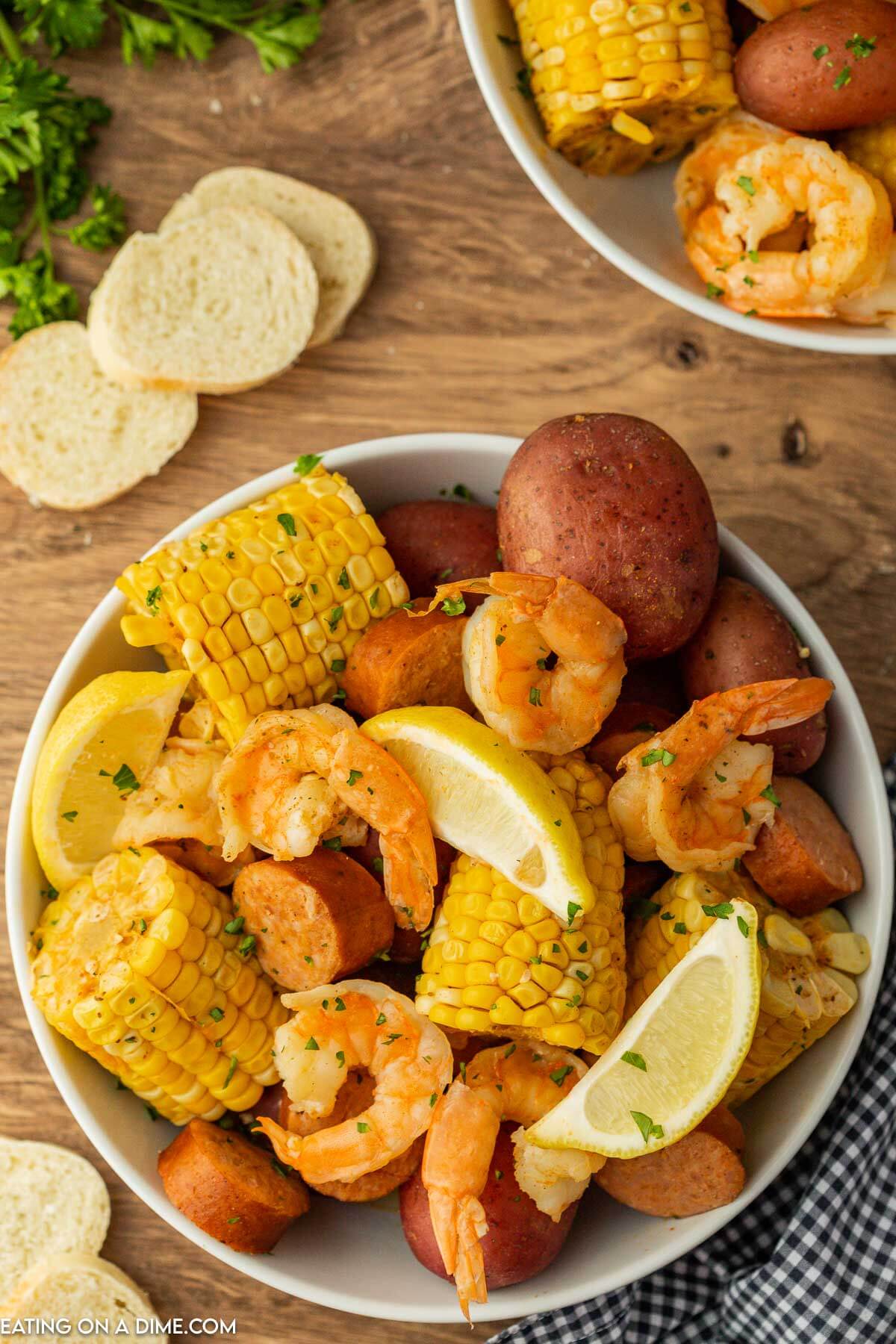 Shrimp boil in a white bowl