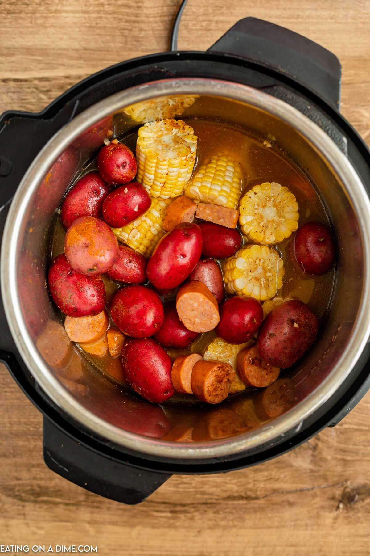 Adding the ingredients to the pressure cooker