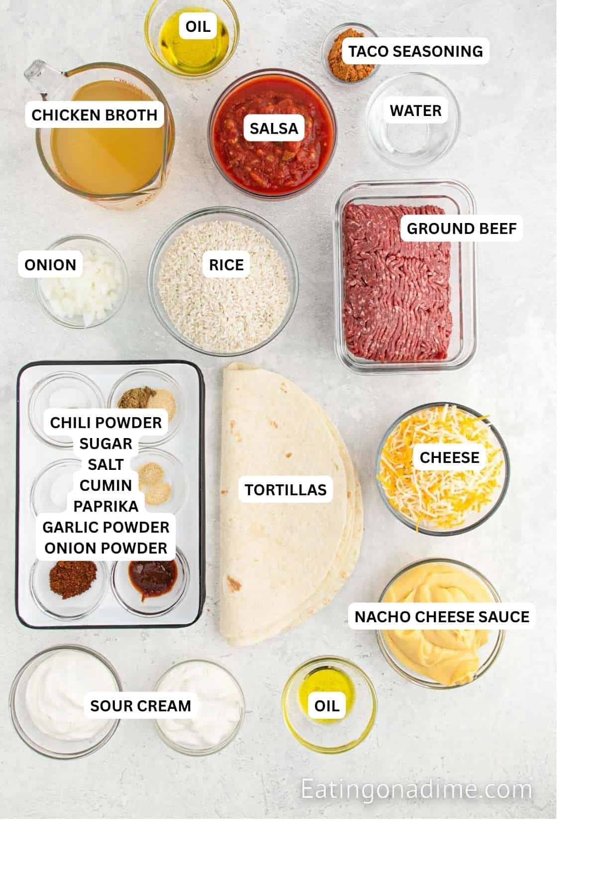 Ingredients for recipe: oil, chicken broth, salsa, taco seasoning, water, onion, rice, ground beef, tortillas, cheese, nacho cheese suae and seasonings.