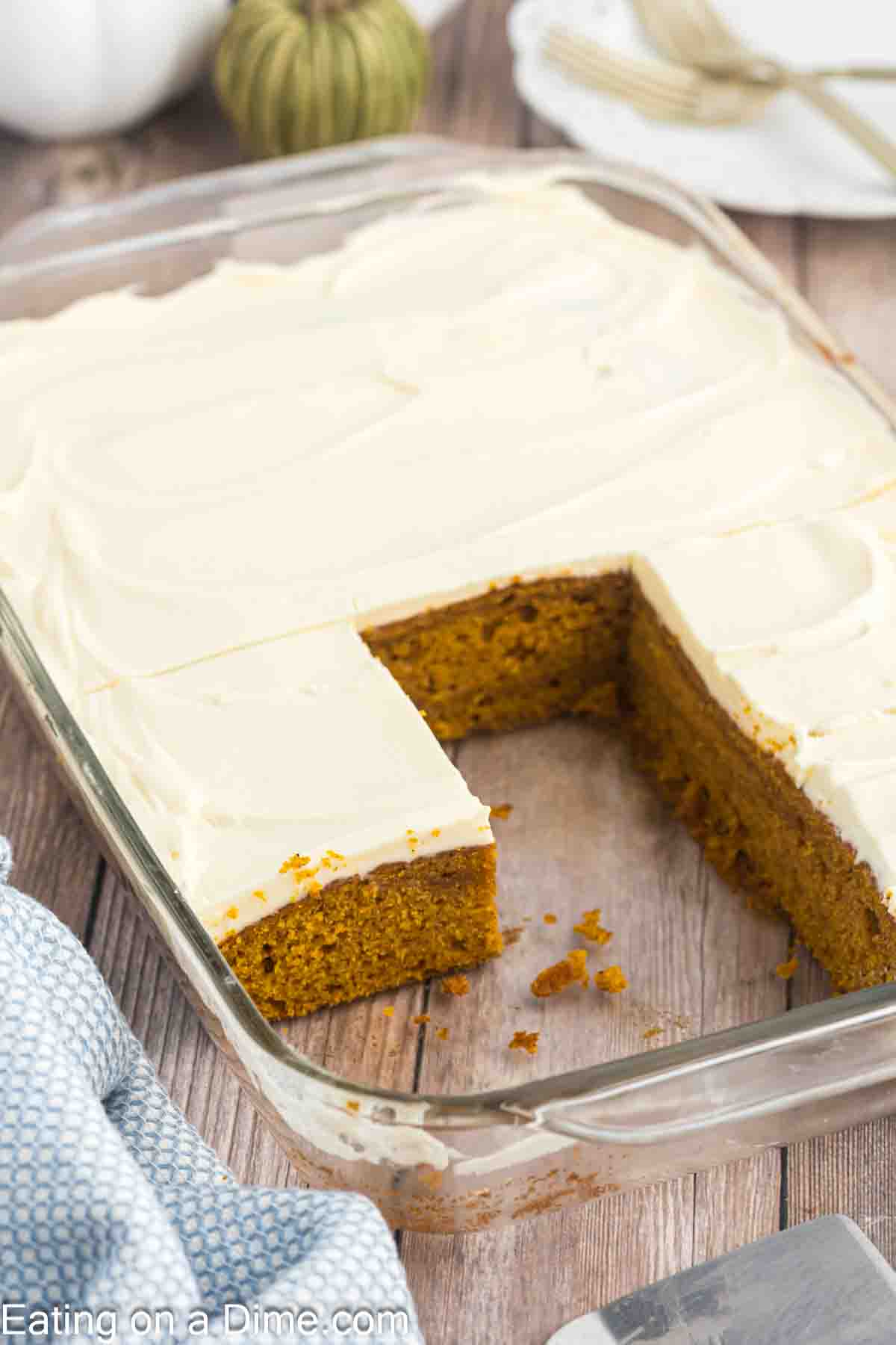 Pumpkin Cake with cream cheese frosting in a baking dish