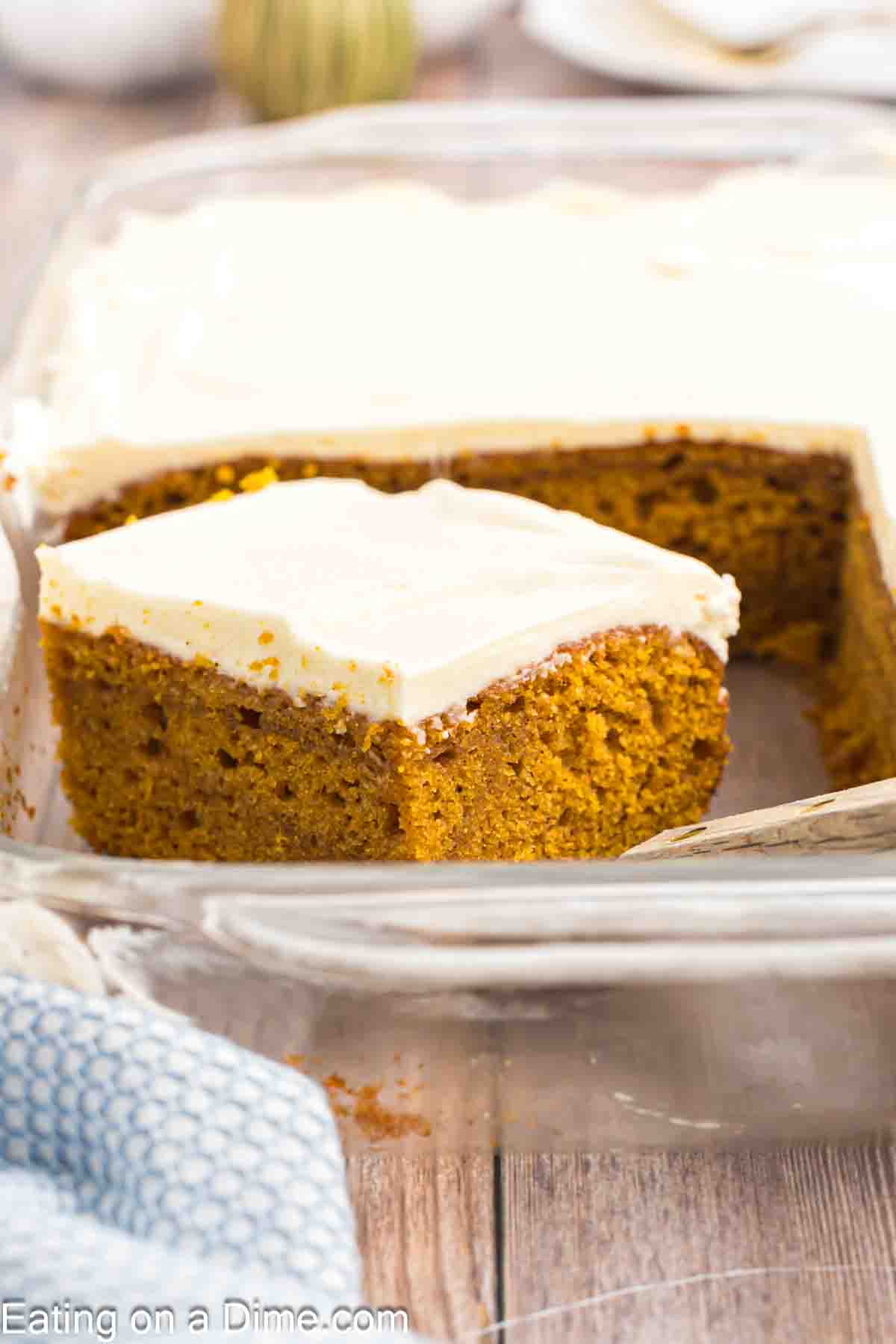 Pumpkin Cake with cream cheese frosting in a baking dish