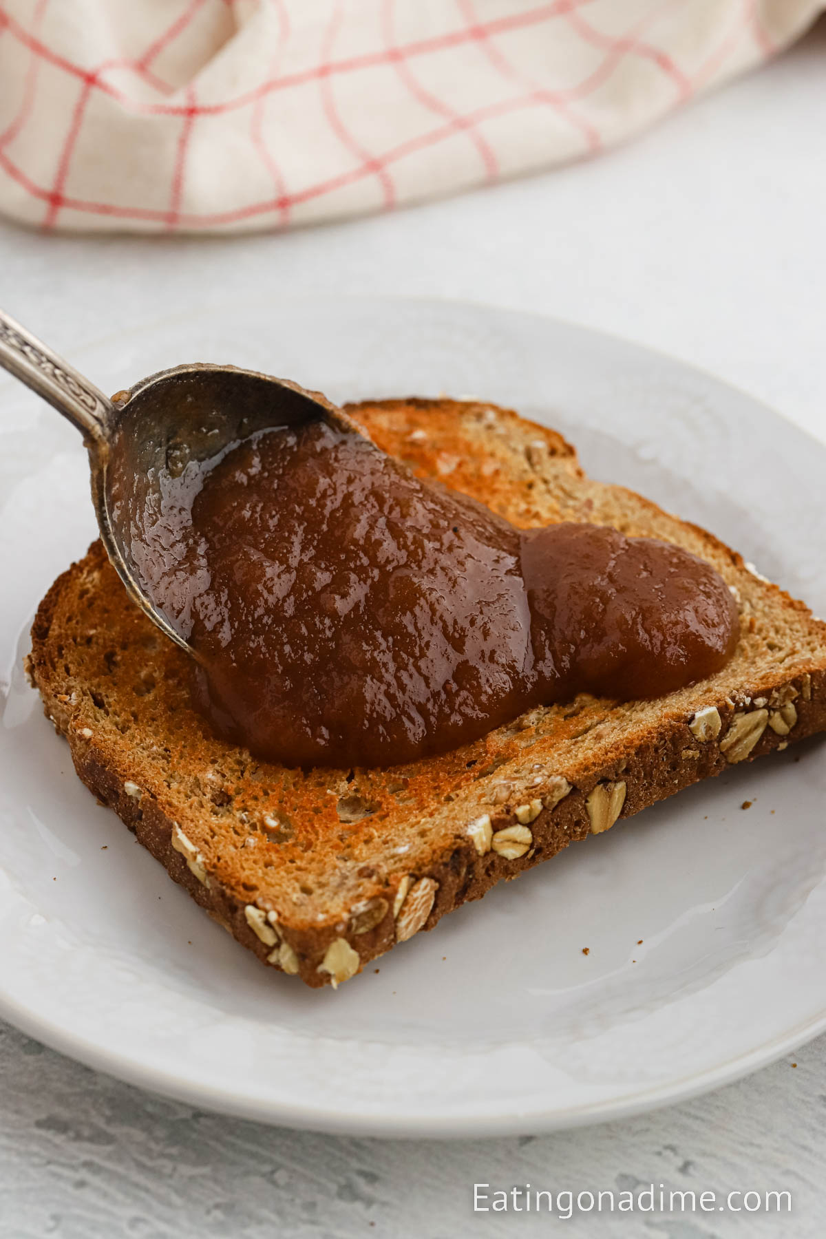 Apple butter spread on a piece of toast