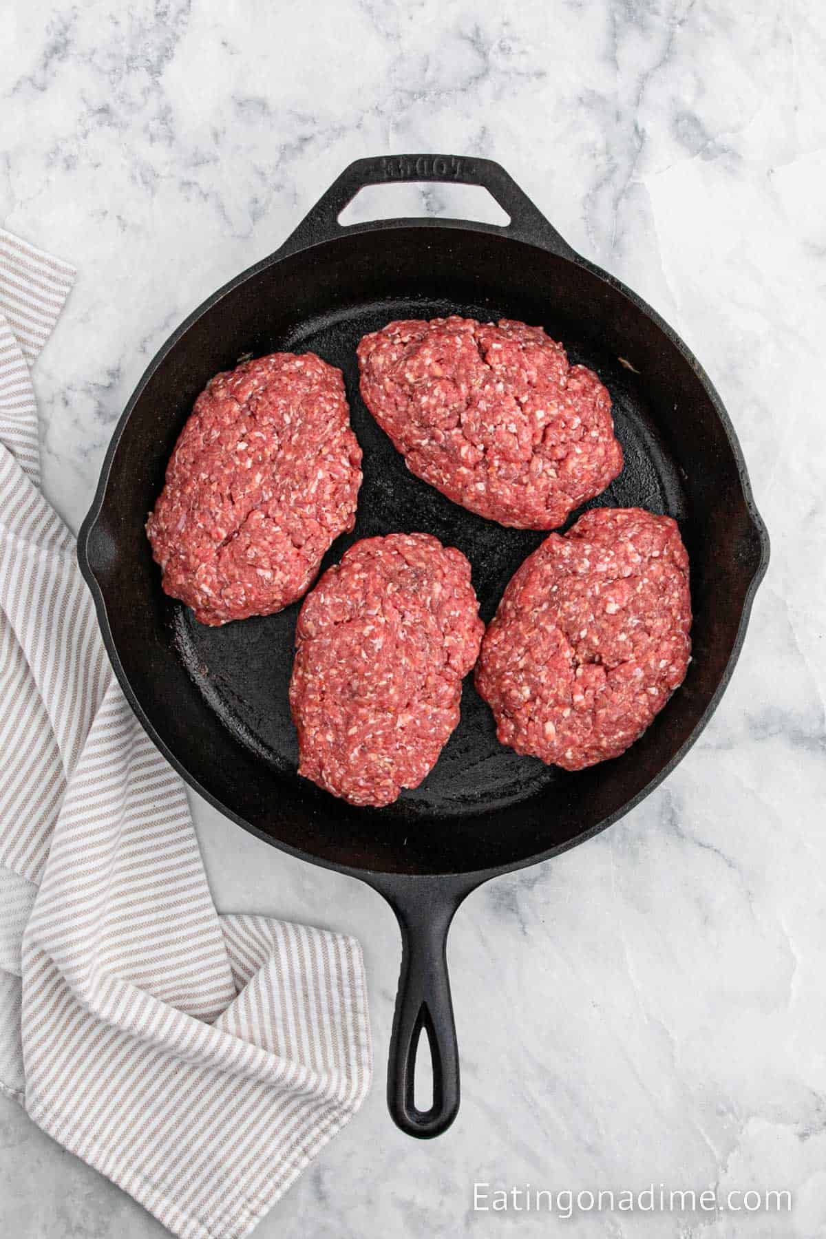 Cooking burgers in a cast iron skillet