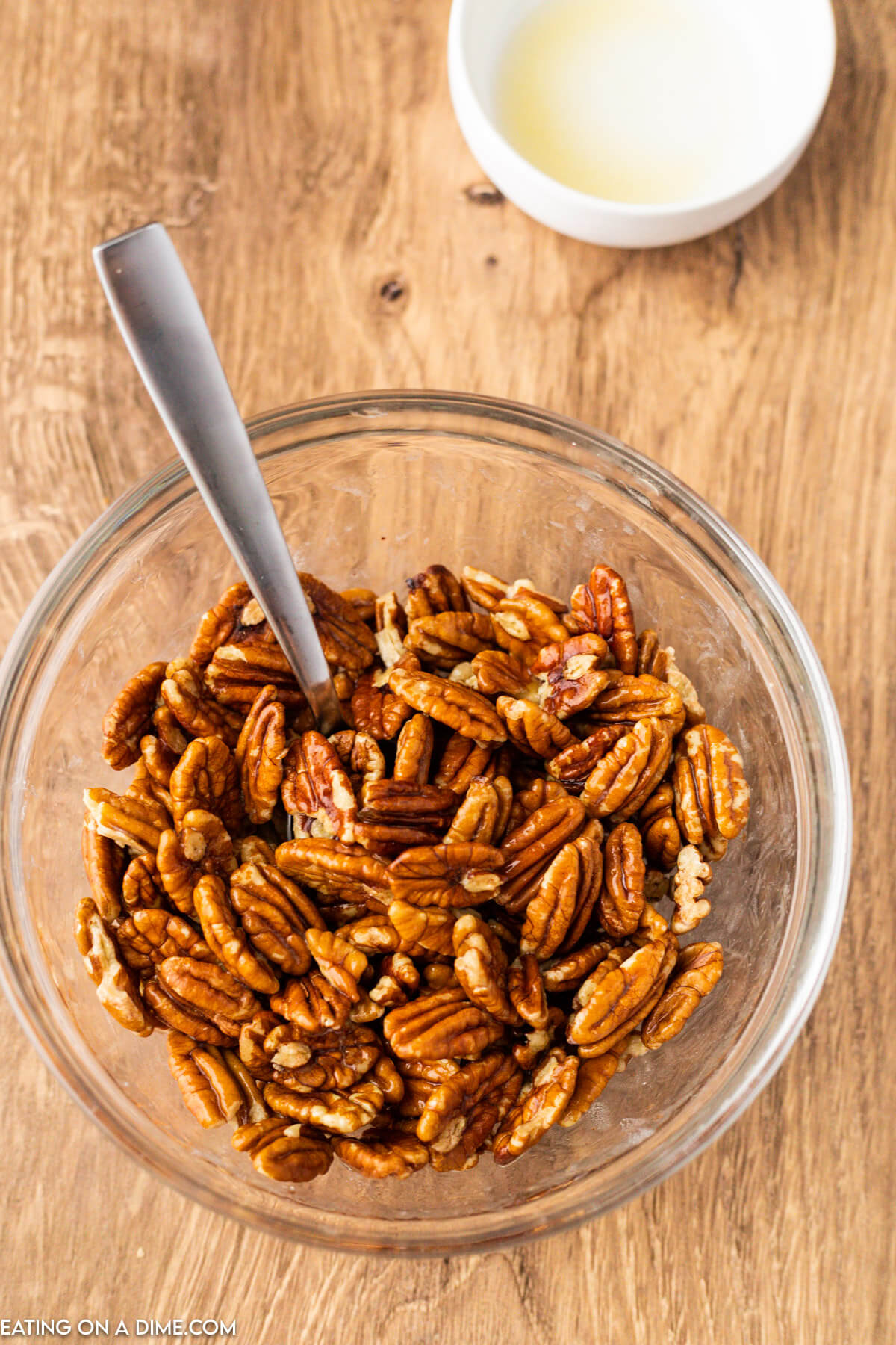 placing pecans in a bowl