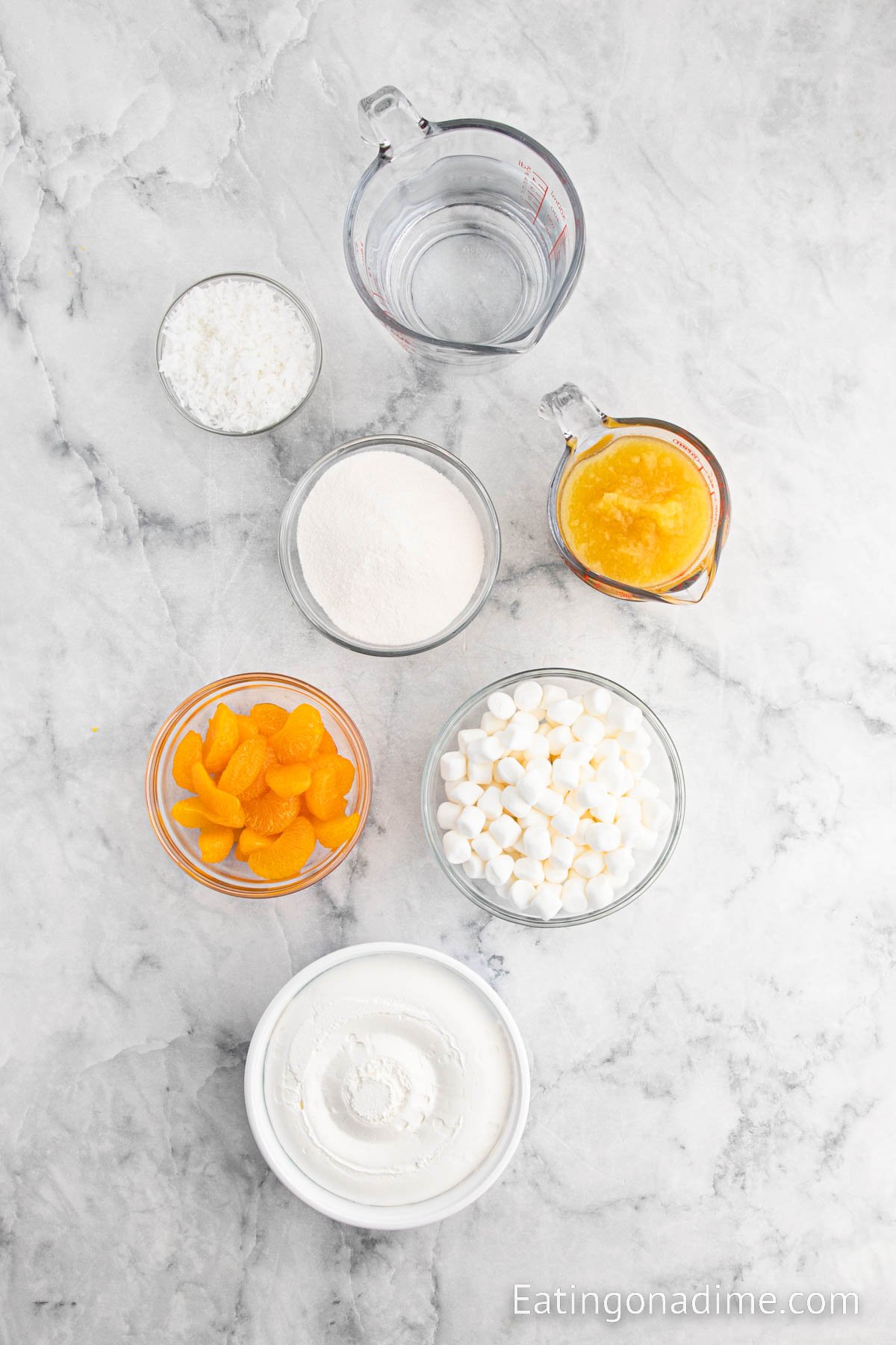 Ingredients needed - Pineapple flavor gelatin, crushed pineapple, cool whip, mandarin oranges, marshmallows, coconut