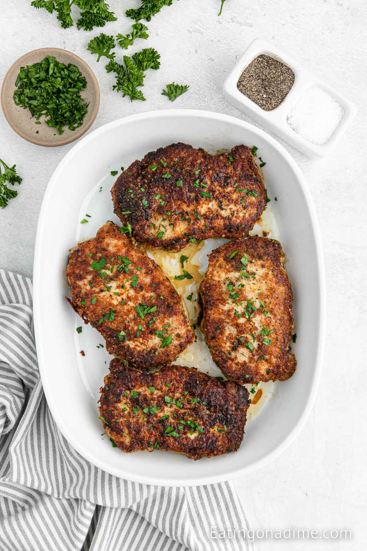 Parmesan Crusted Pork Chops in a baking dish