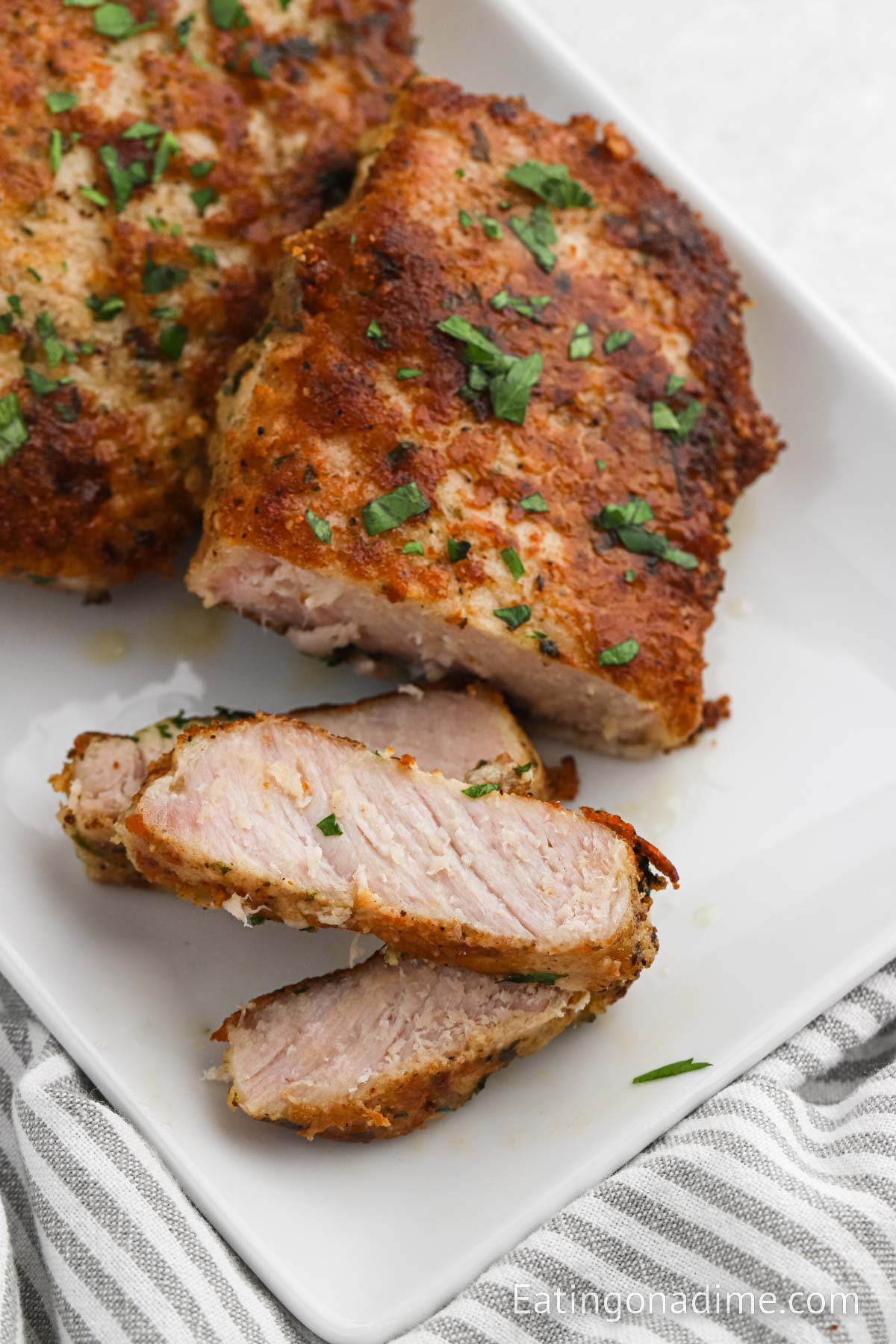 Parmesan Crusted Pork Chops in a baking dish