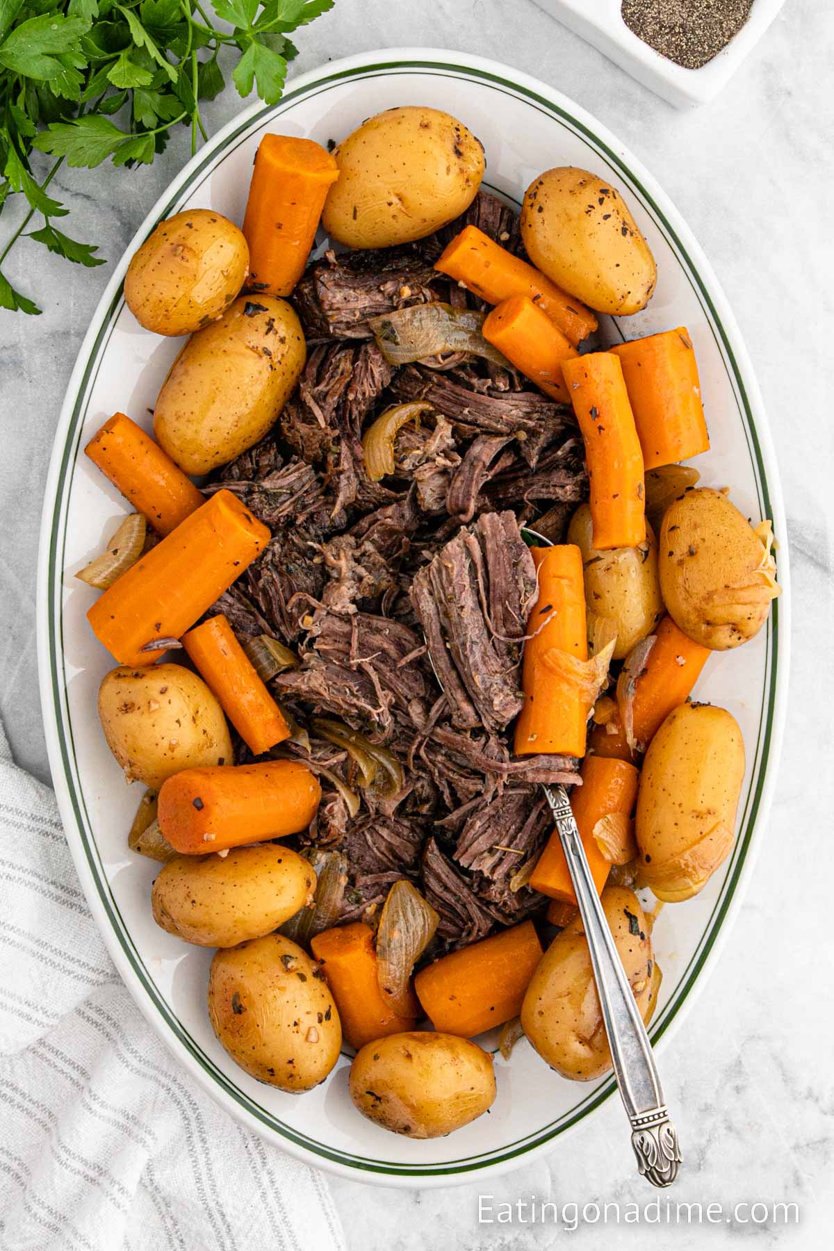 Pot Roast with carrots and potatoes on a serving platter