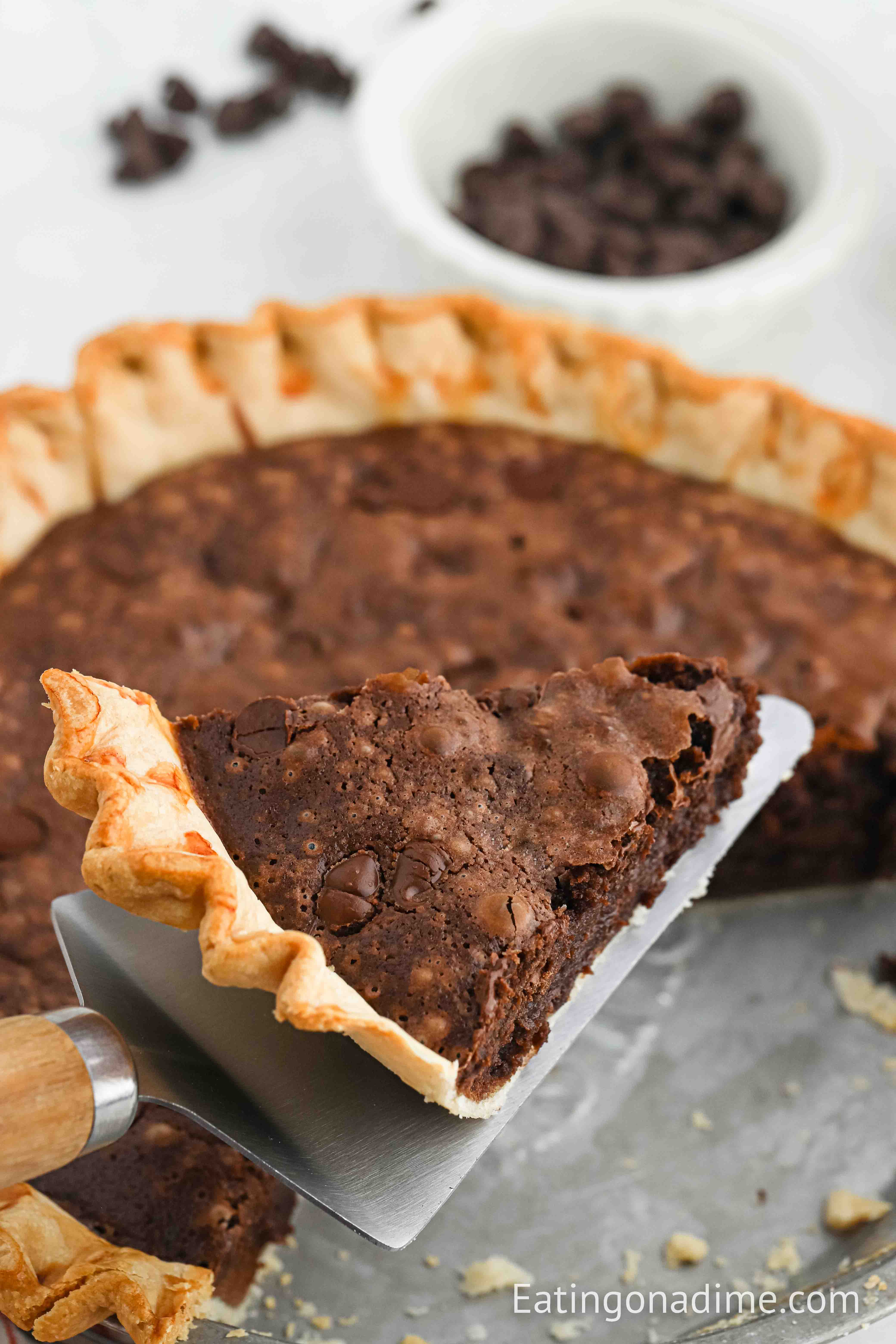 Close up image of Brownie Pie with a slice on the spatula