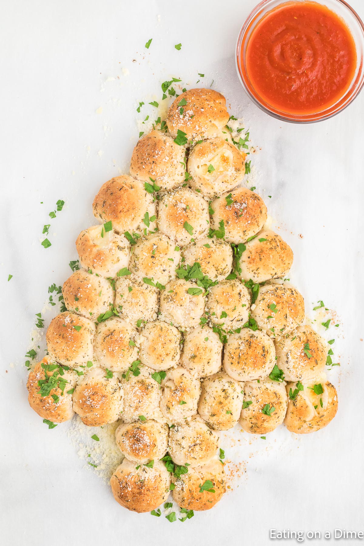 Christmas Tree Pull Apart Bread with a side of marinara sauce
