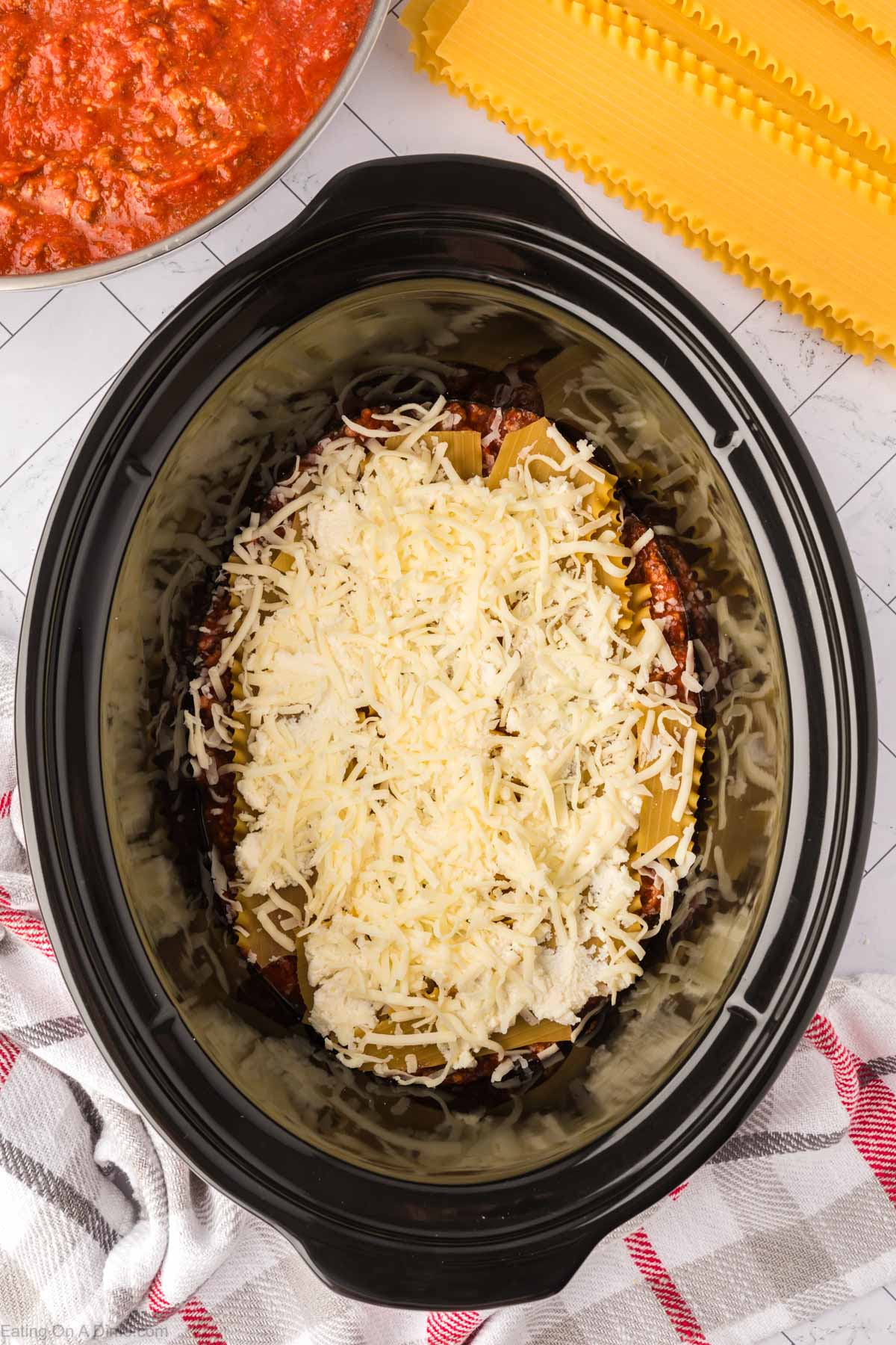 Layering the ingredients in the slow cooker