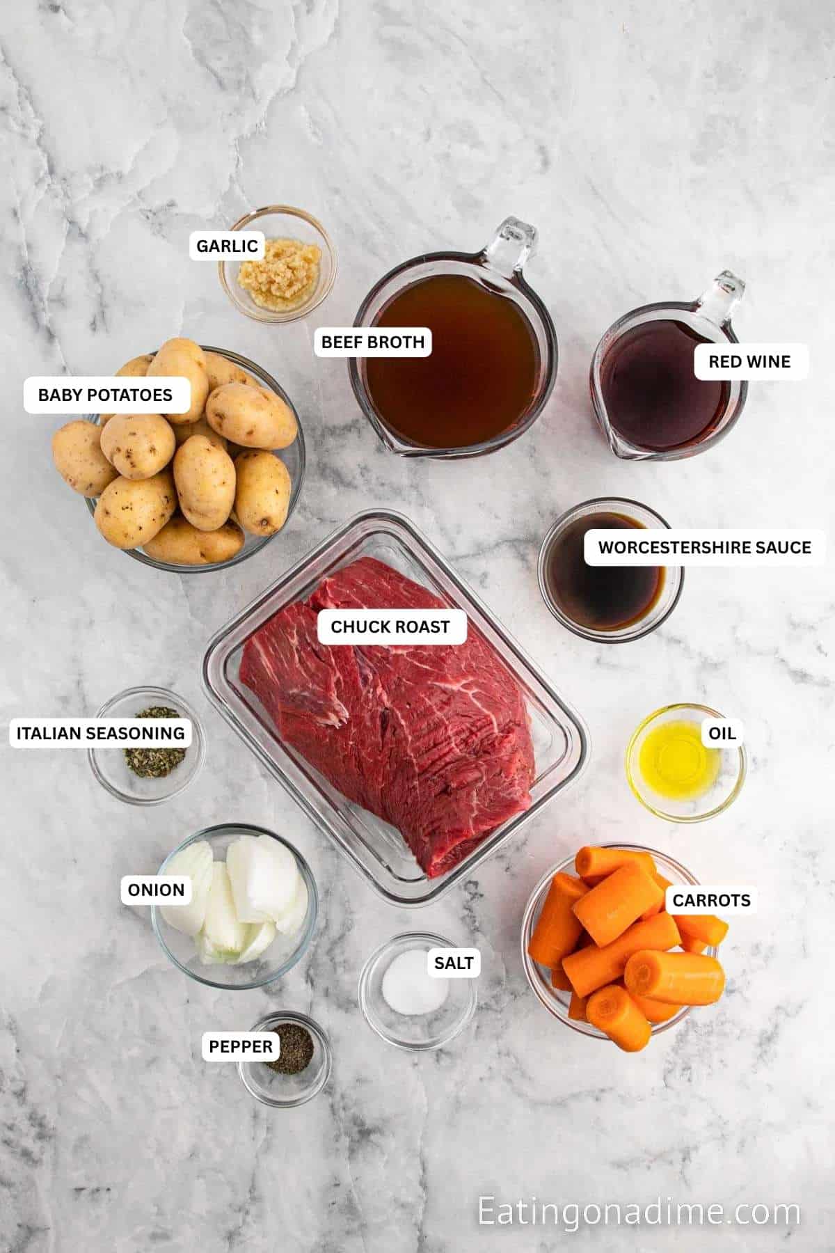 Ingredients for recipe: garlic, beef broth, red wine, potatoes, chuck roast, Worcestershire sauce, Italian seasoning, oil, onion, salt, carrots and pepper.