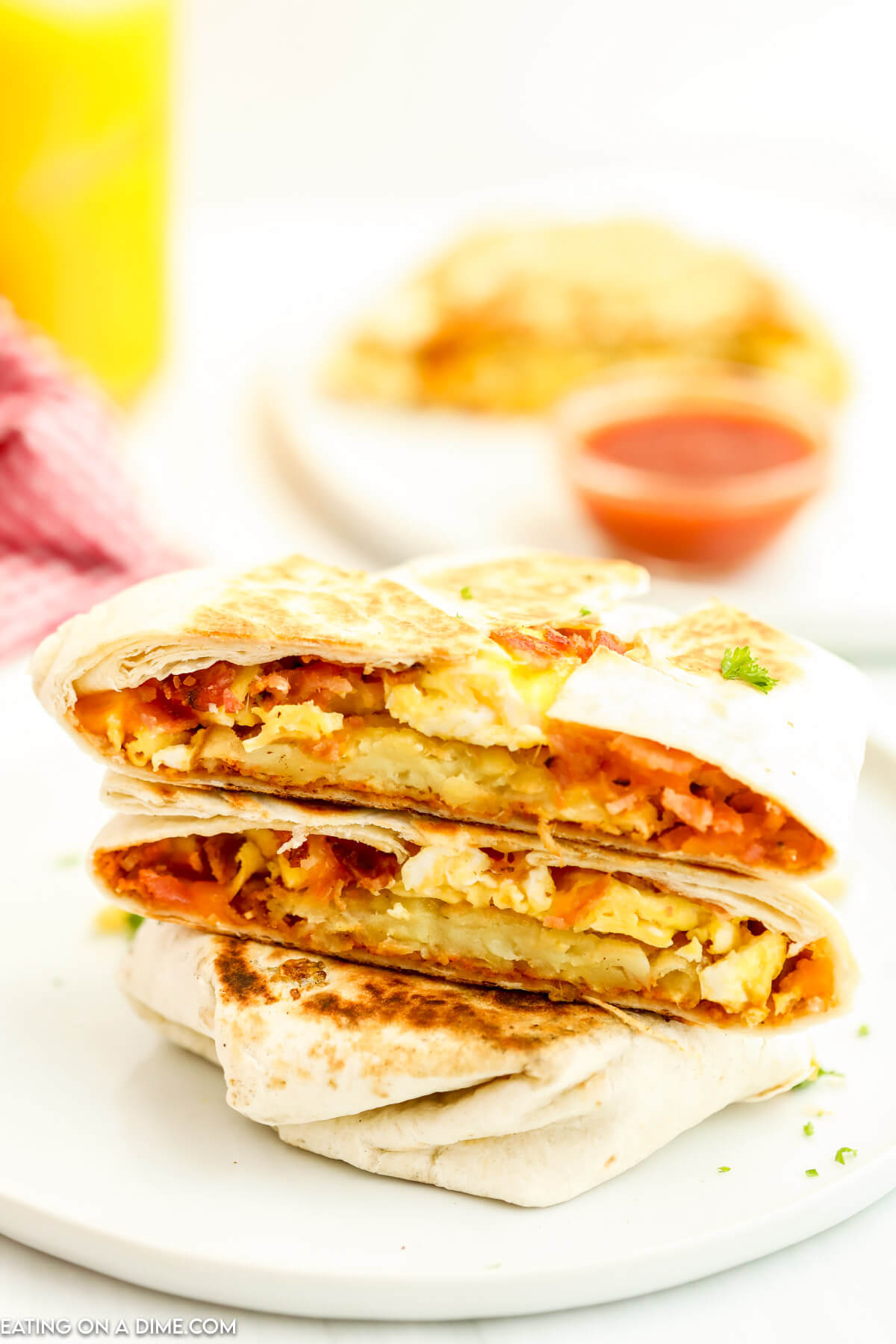 Taco Bell Breakfast Crunchwrap stacked on a plate