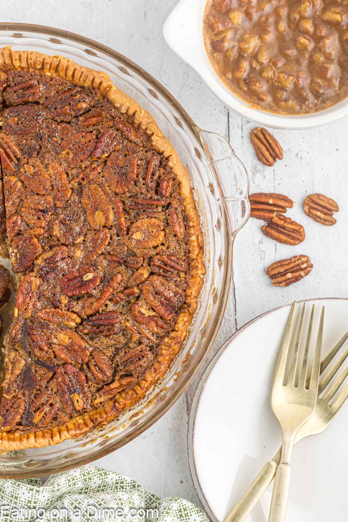 Whole pecan pie in a pie plate