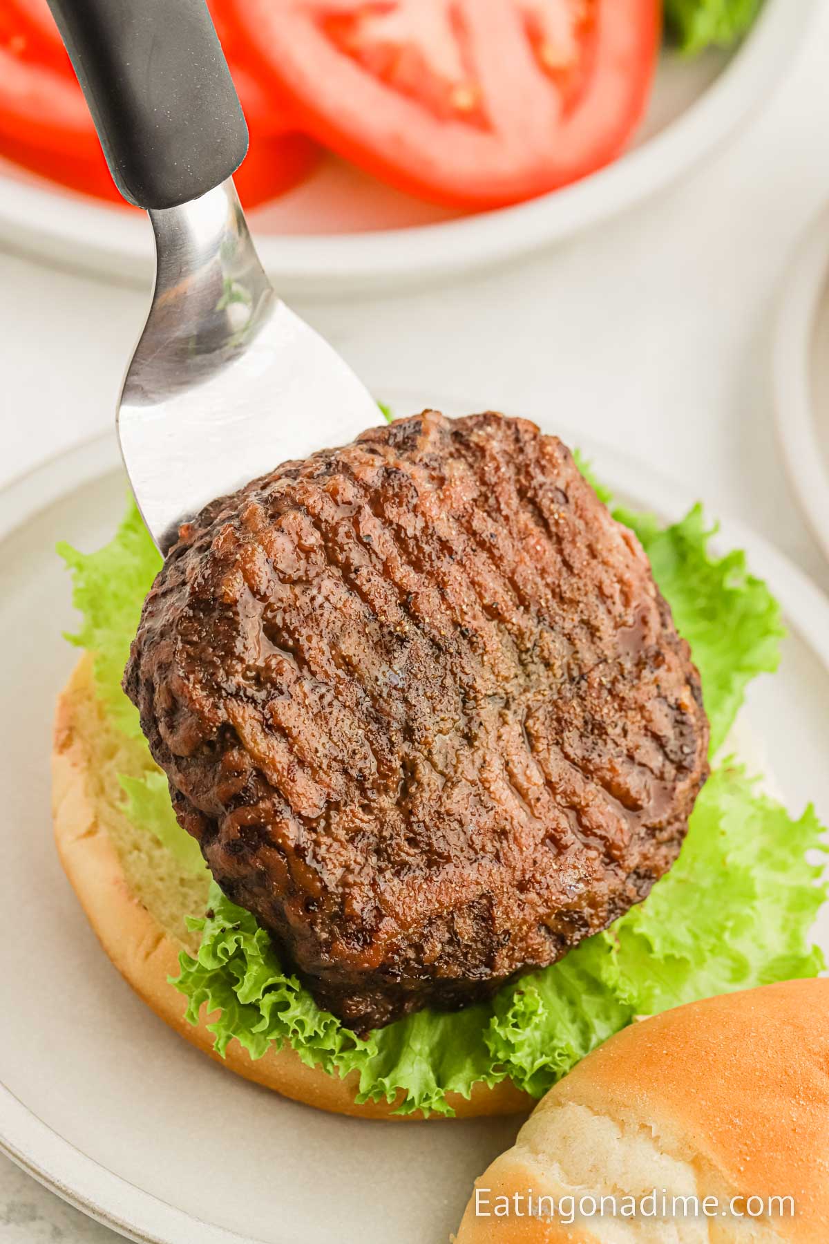 Baked Burger on hamburger bun and lettuce