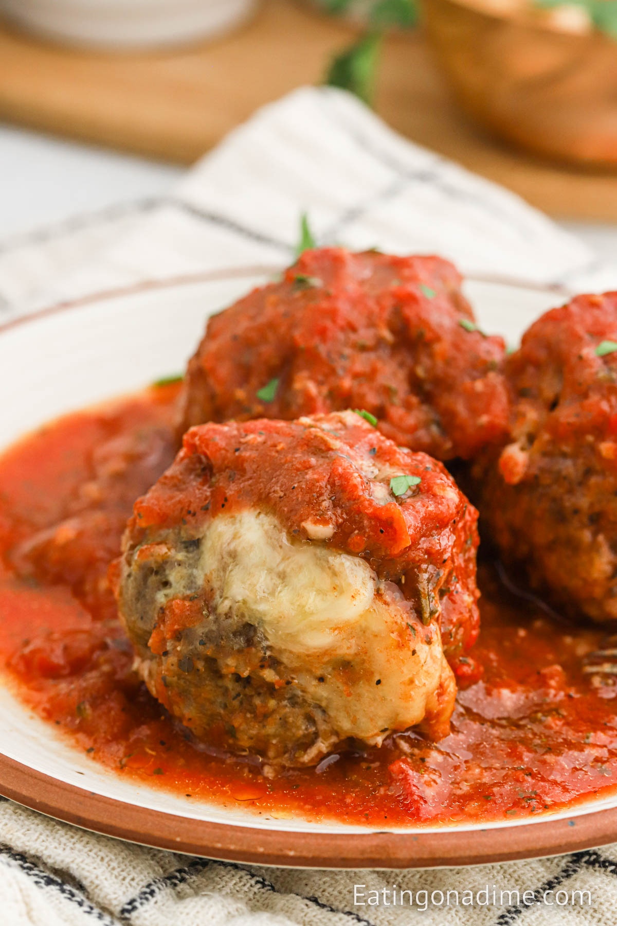 Stuffed meatballs on a plate with sauce
