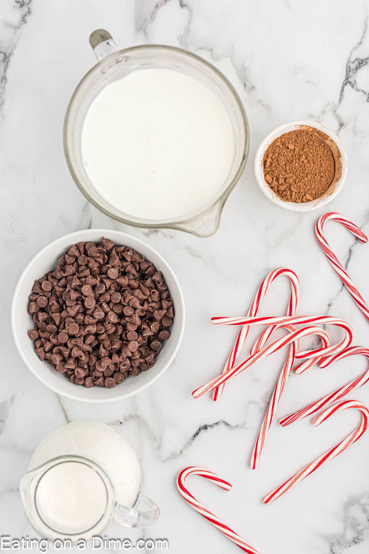 Peppermint Hot Chocolate Ingredients - whole milk, heavy cream, chocolate chips, cocoa powder, candy canes