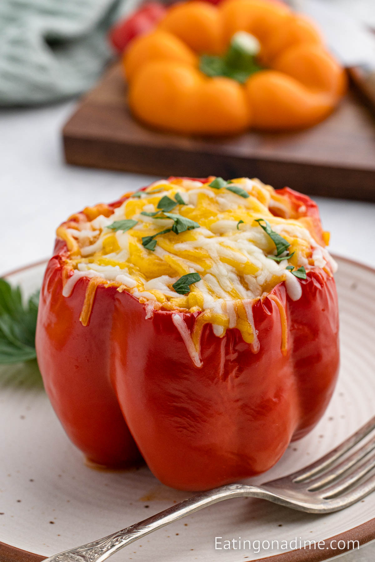 Close up image of chicken stuffed peppers on a plate