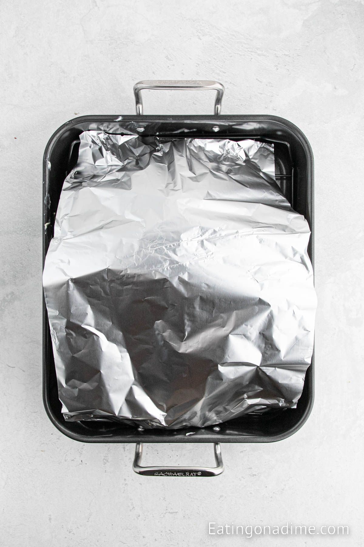 Covering the pan with foil in a roasting pan