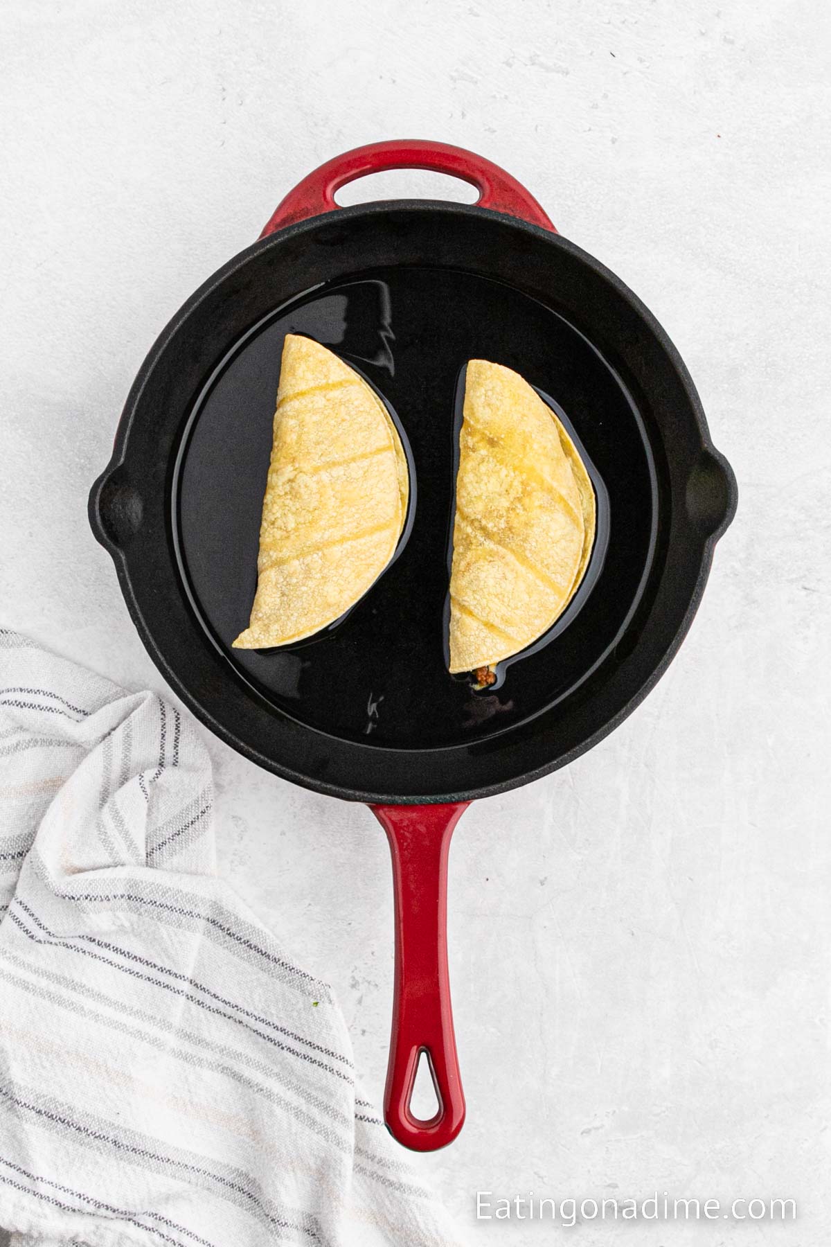 Frying tacos in a skillet