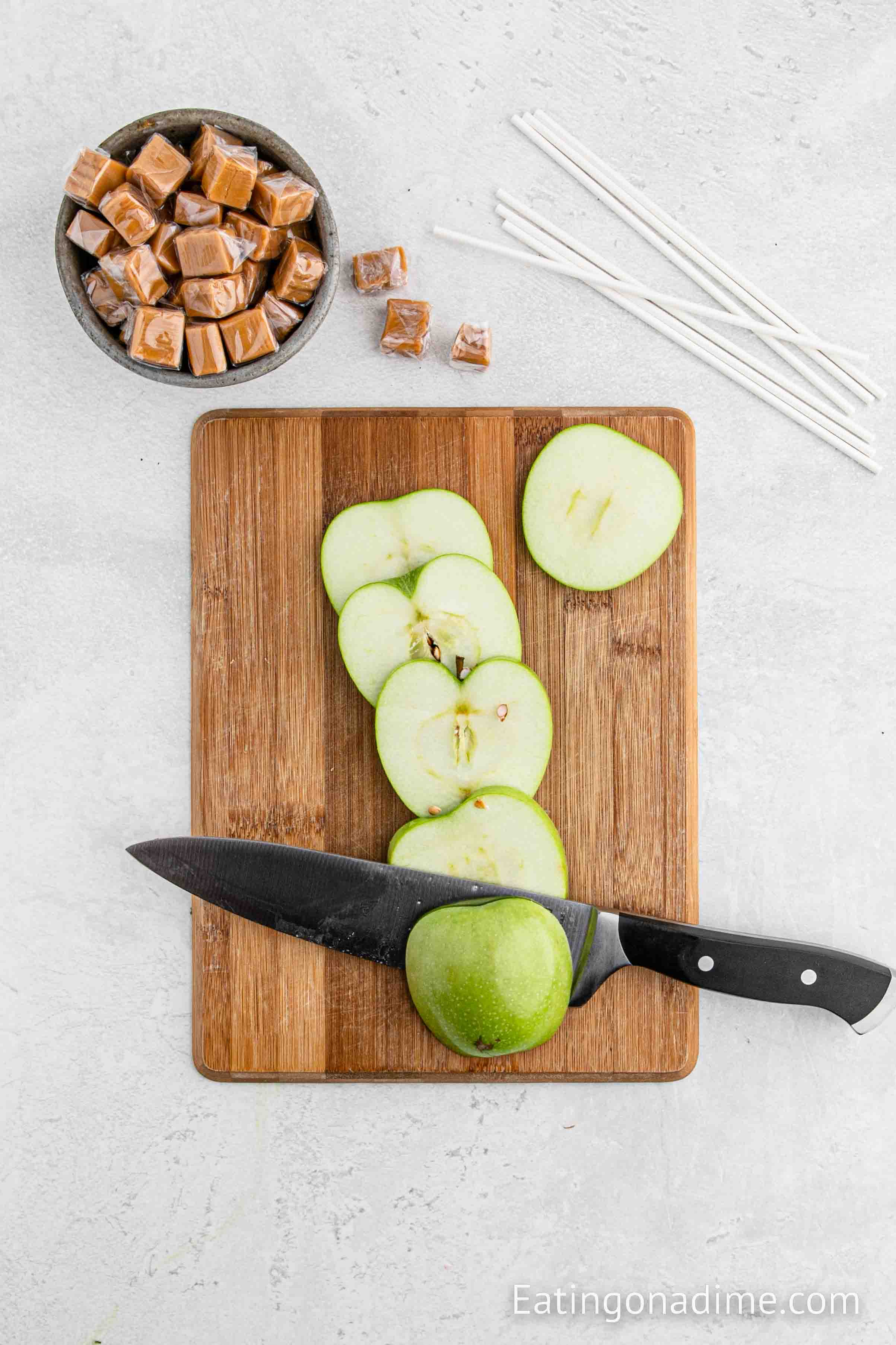 Slicing apples on a cutting board
