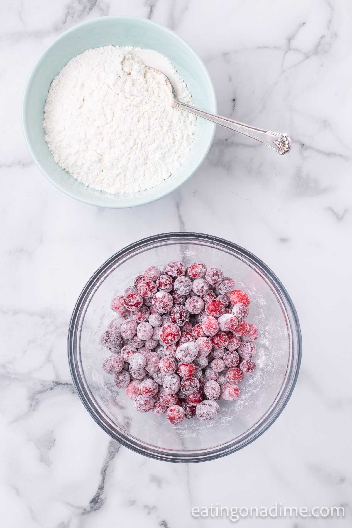 Bowl of cranberries with flour. 