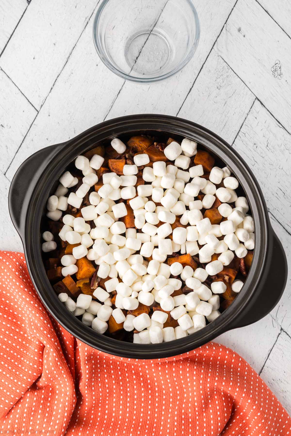 The marshmallow topped on the sweet potatoes in the crock pot.  
