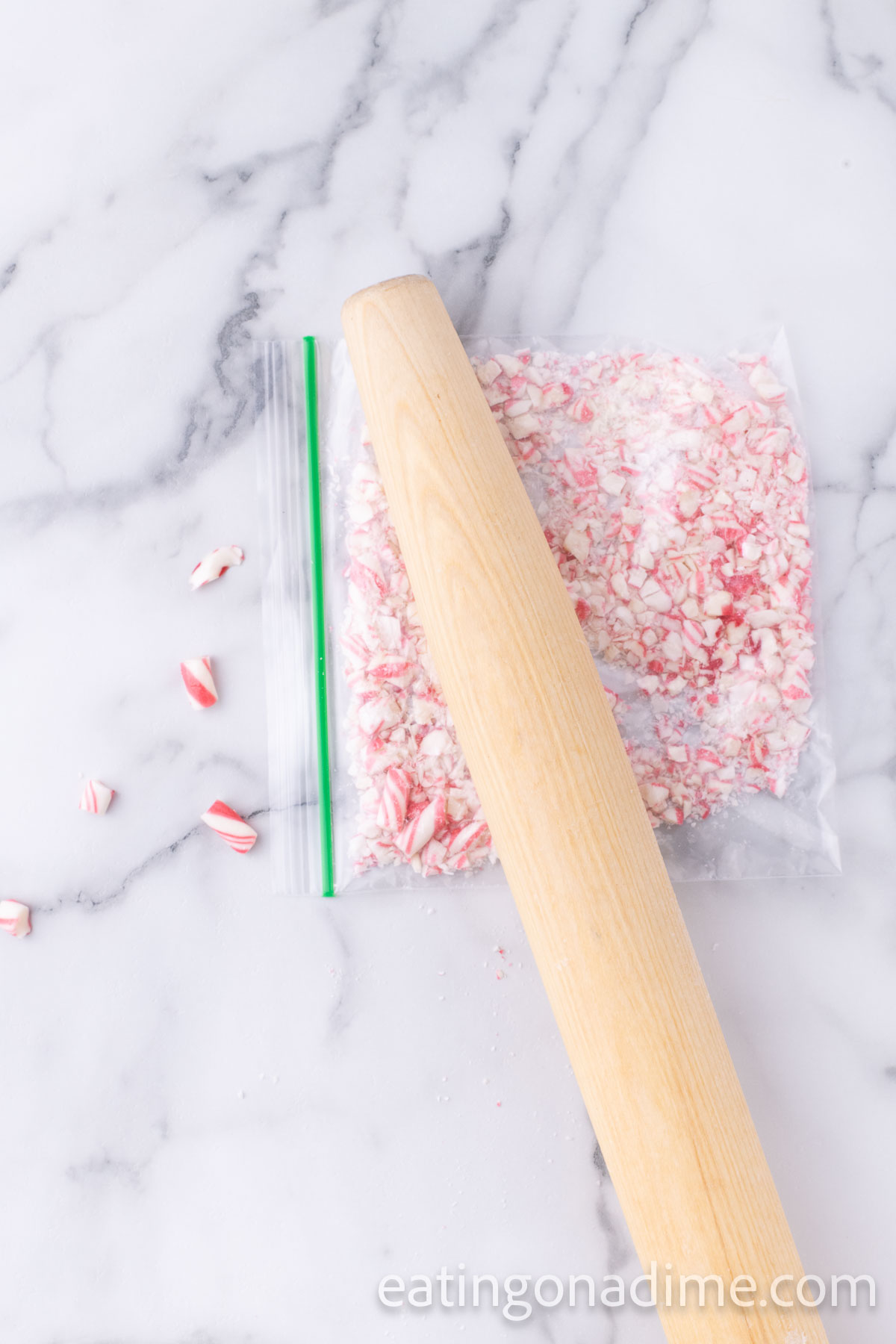 Crushing the Peppermint Candies with rolling pin a zip loc bag