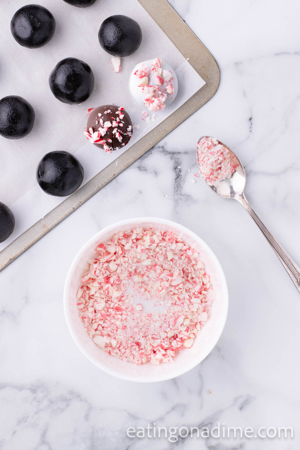 Topping the crushed Peppermint on top of Oreo Balls