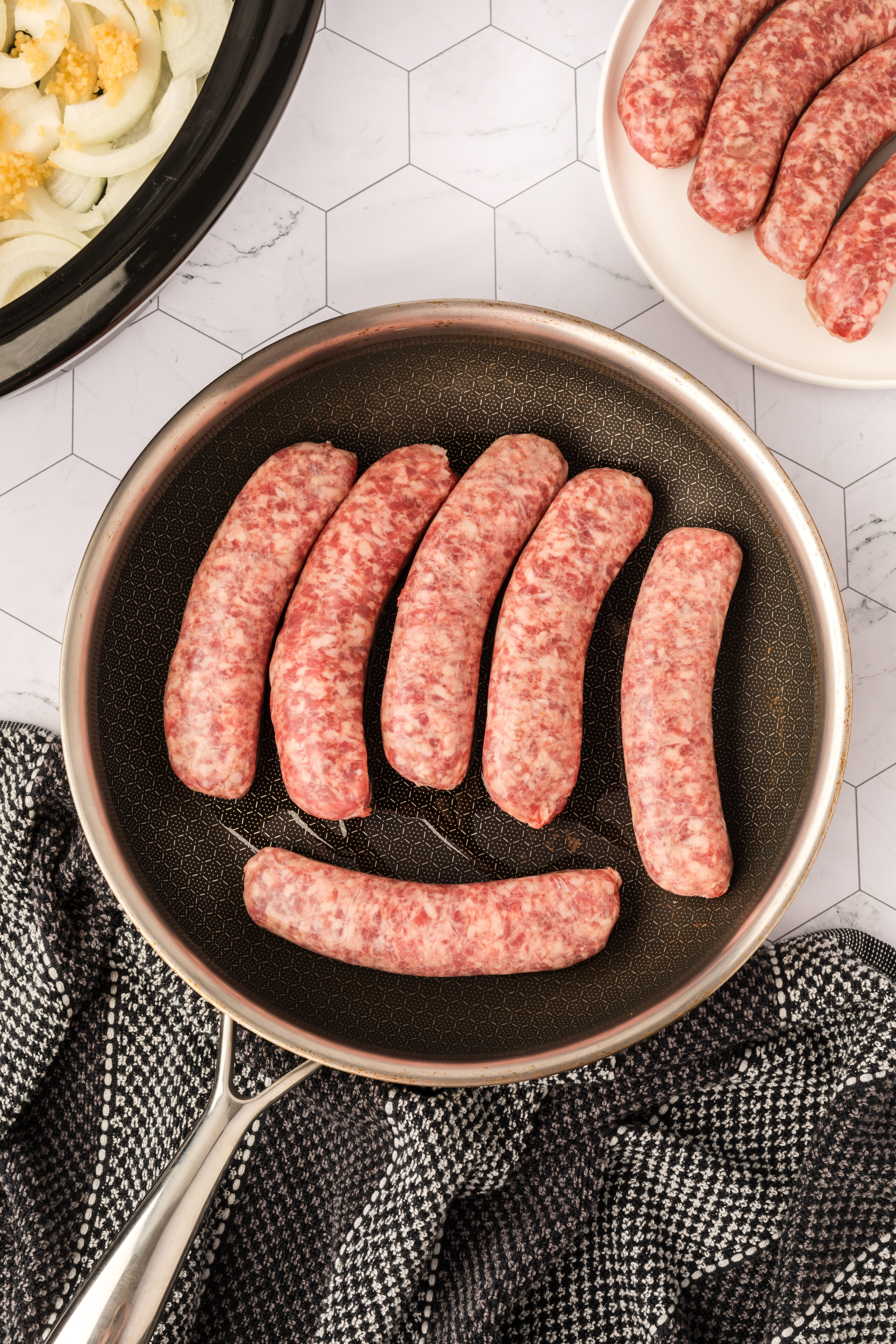 Searing the brats in a skillet