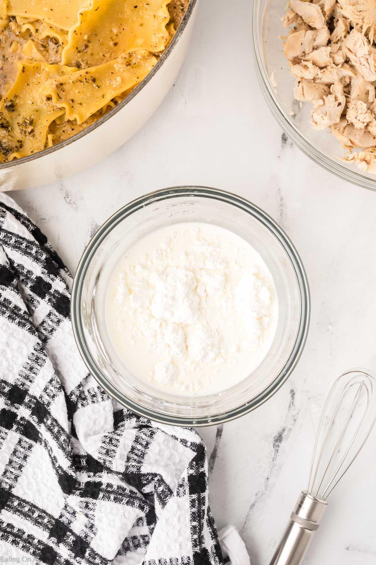 Mixing the cornstarch slurry together in a bowl