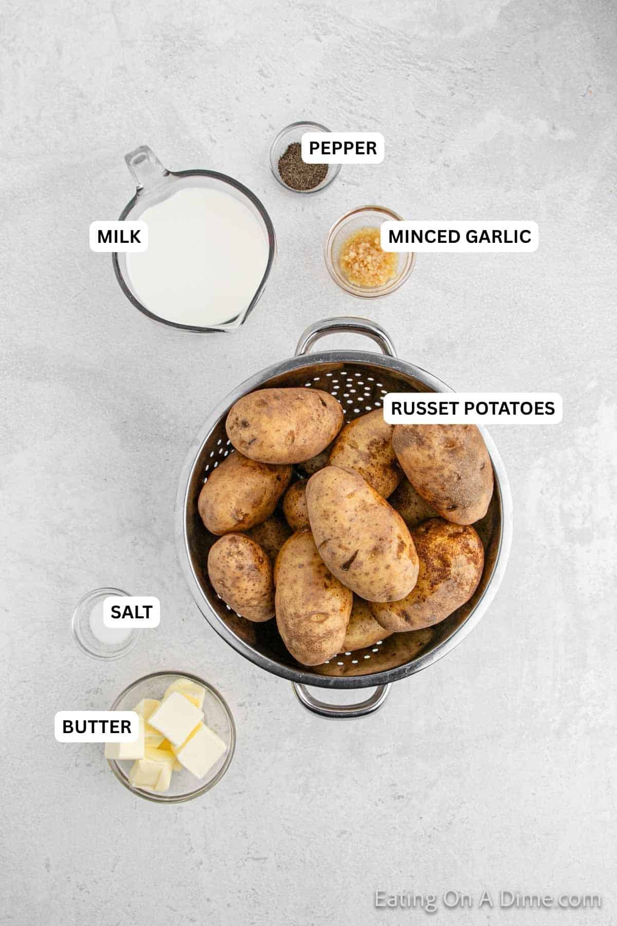 Ingredients for recipe: pepper, milk, minced garlic, salt, butter and russet potatoes.