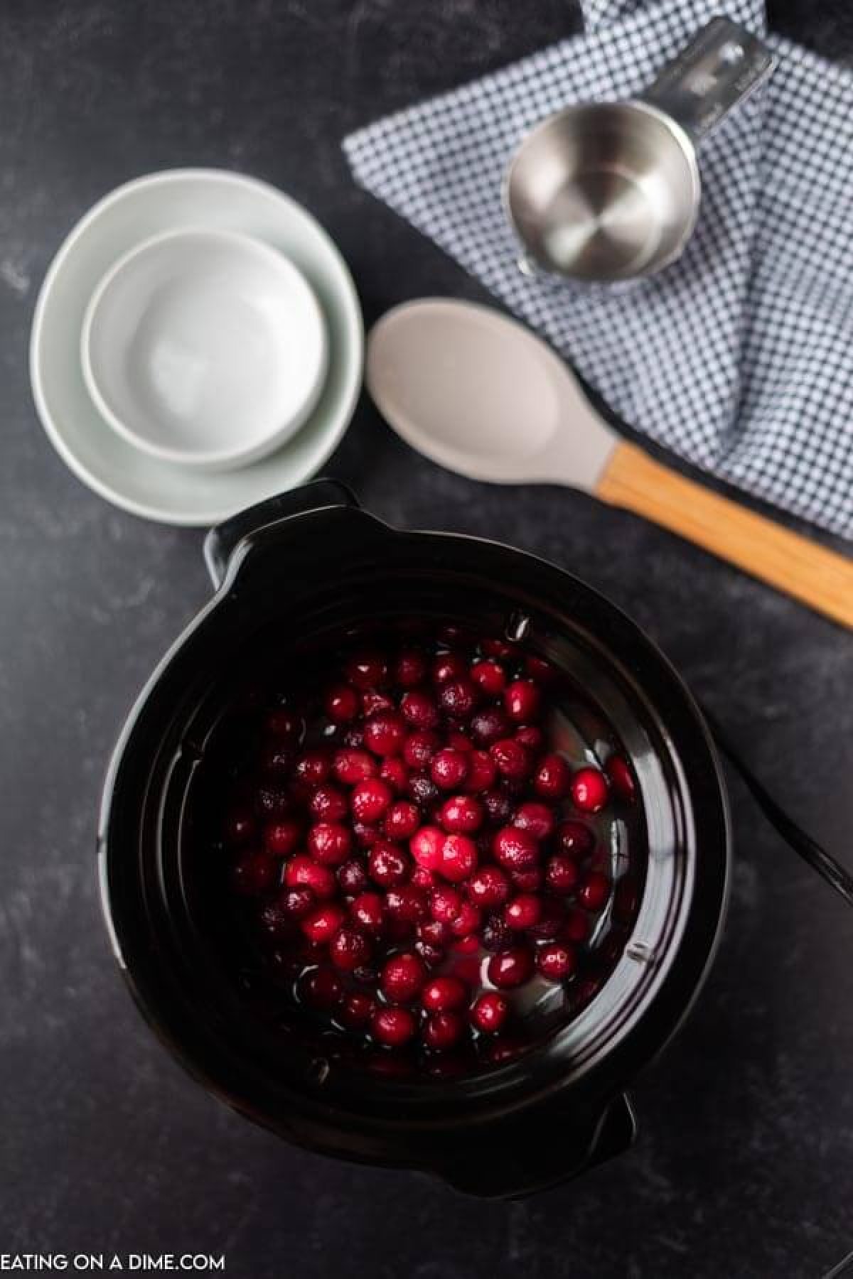 cranberries in the crock pot ready to be cooked