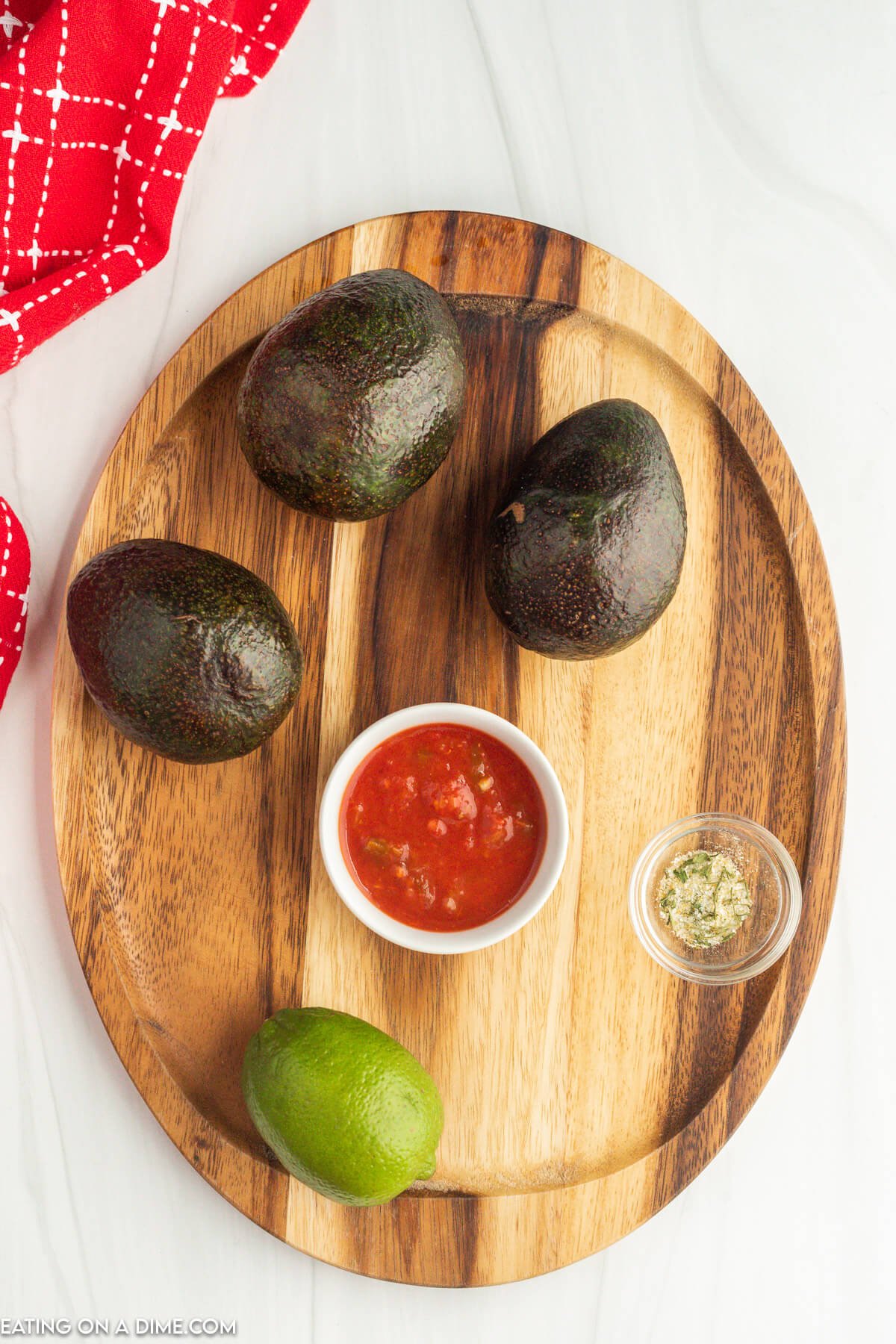 Ingredients - Ripe avocados, lime, garlic salt, salsa, chips