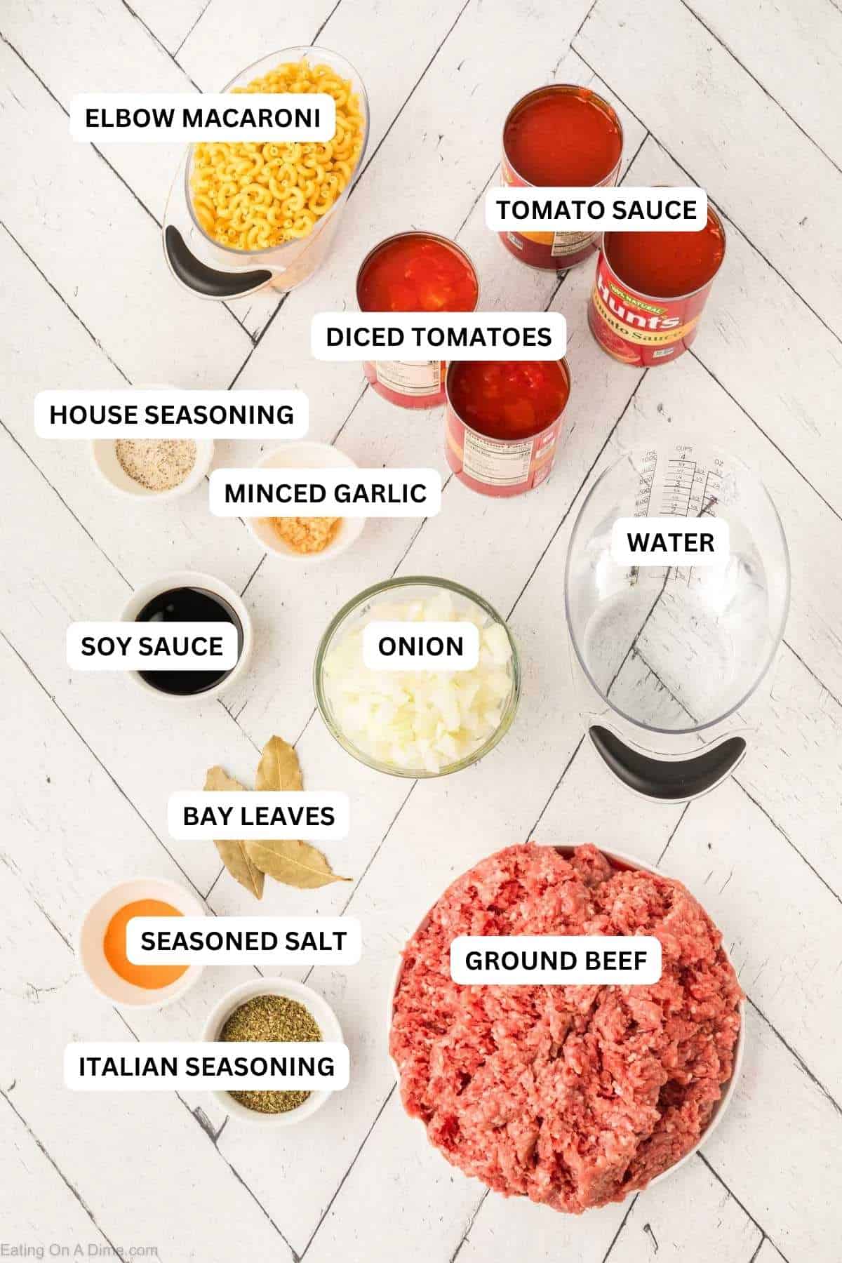 Ingredients for recipe: elbow macaroni, tomato sauce, diced tomatoes, house seasoning, minced garlic, water, soy sauce, onion, bay leaves, seasoned salt, Italian seasoning and ground beef.