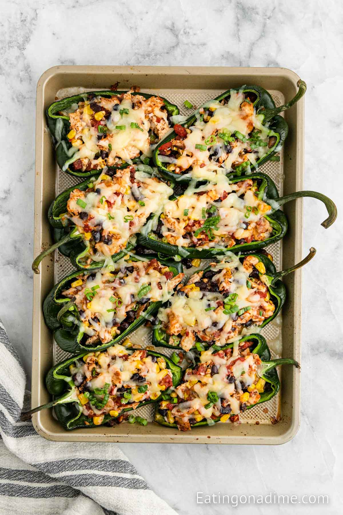 Chicken Stuffed Poblano Peppers on a baking sheet