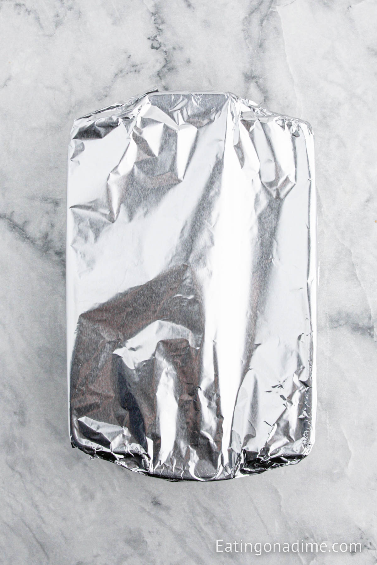 Baking dish covered with aluminum foil