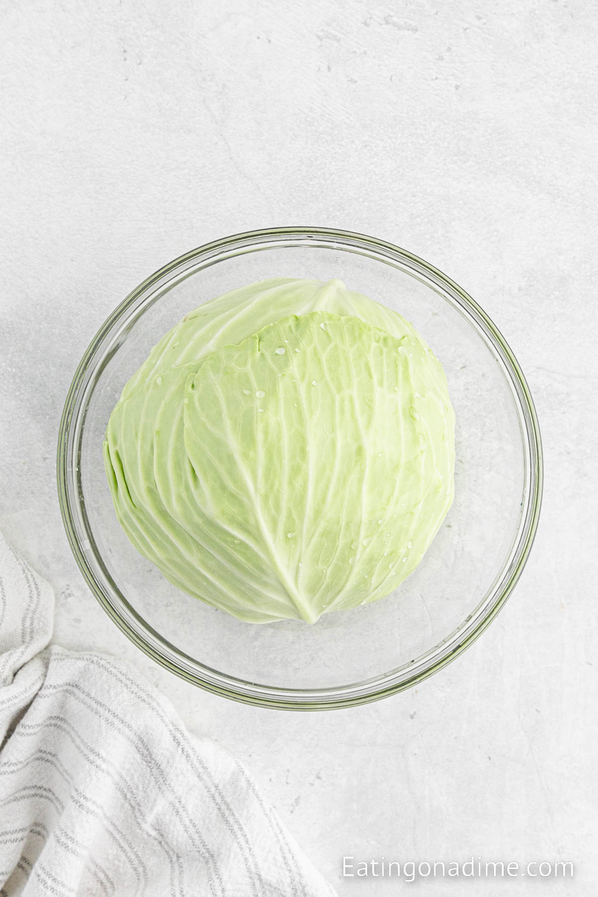 Placing the cabbage in a bowl
