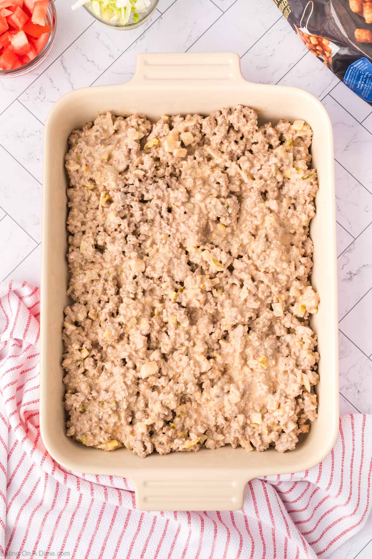 Ground Beef mixture spread into a baking dish